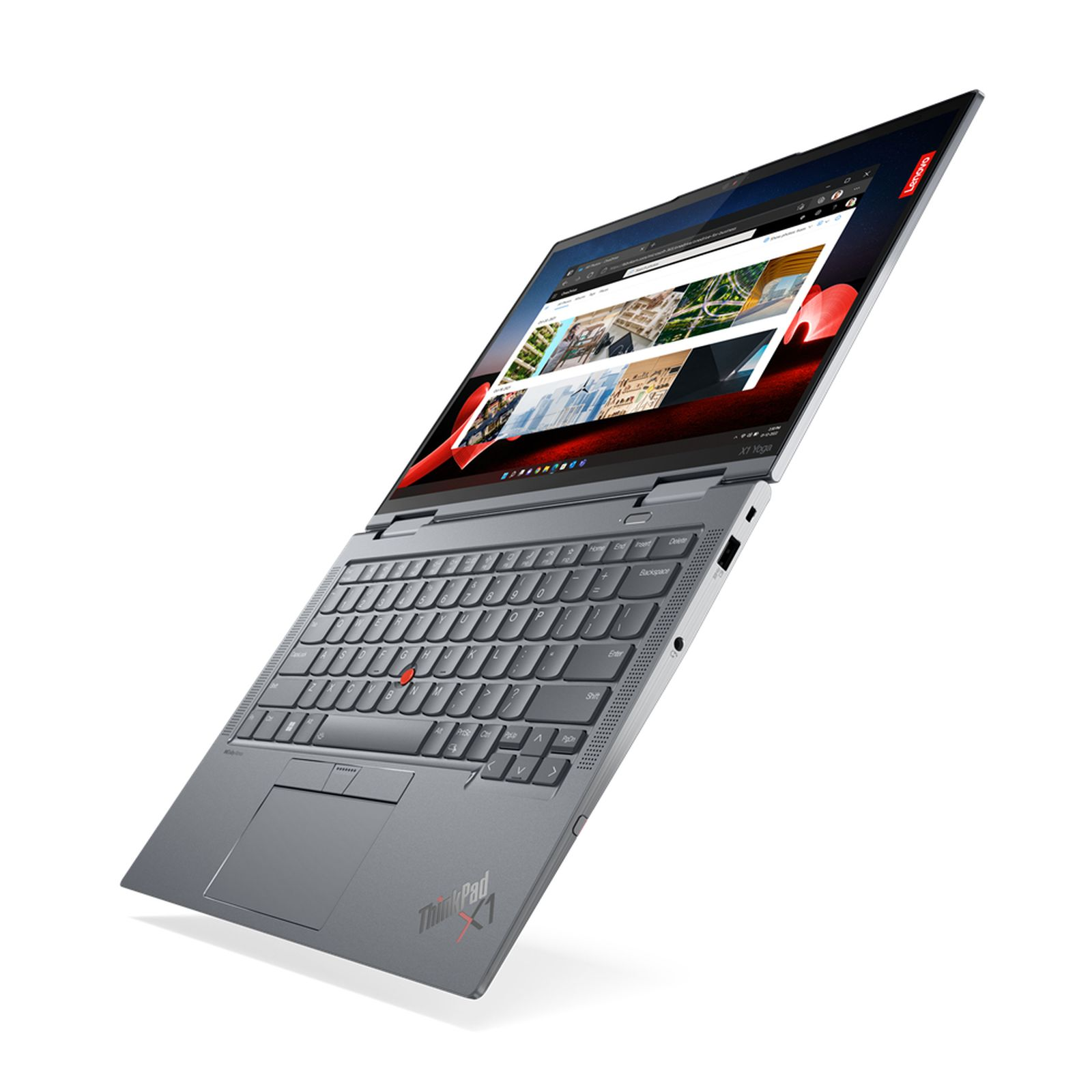 Laptop ThinkPad X1 argentato in posizione aperta inclinata, che mostra tastiera e schermo.
