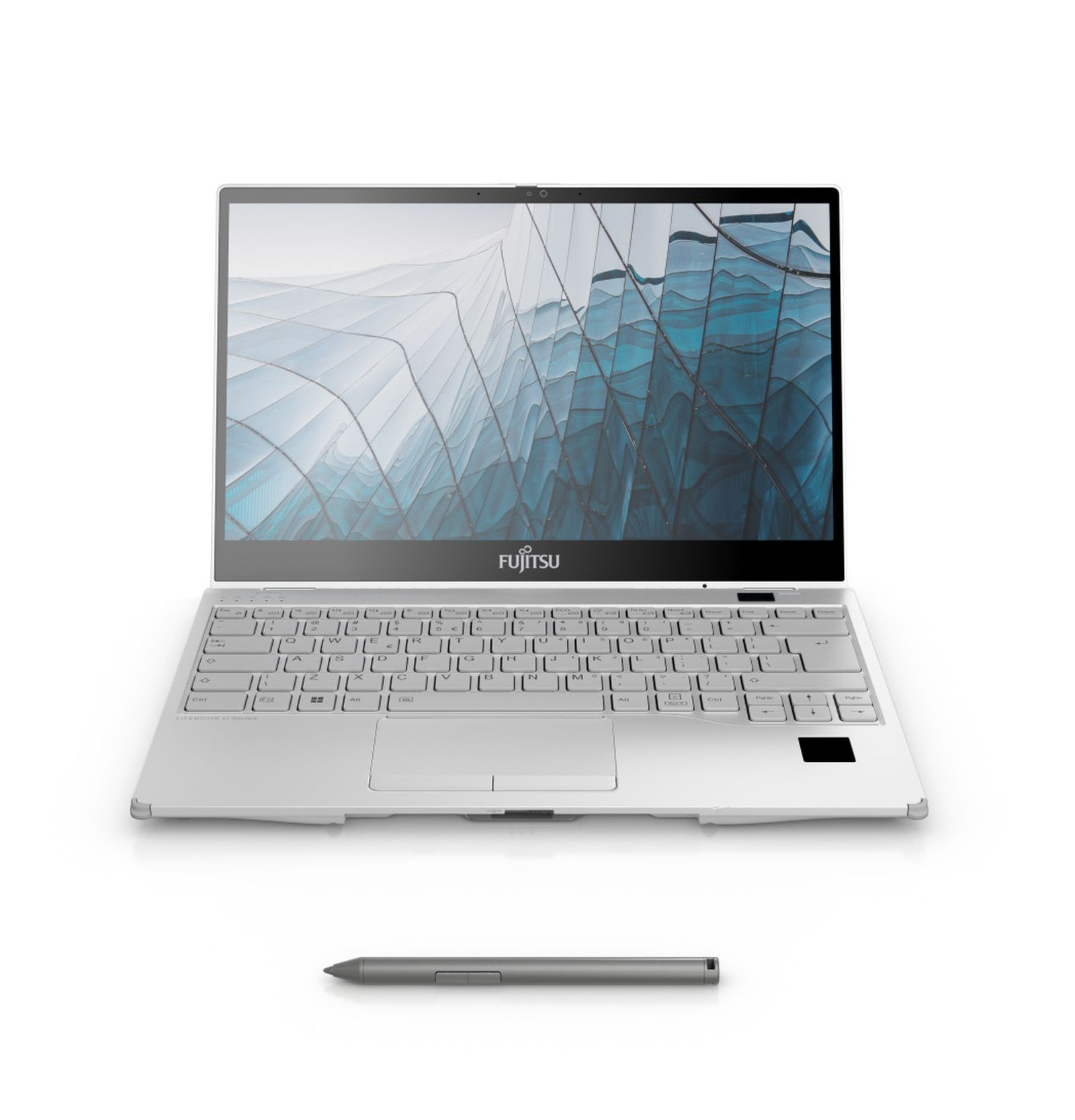 Un laptop argentato con uno stilo su sfondo bianco, che mostra un design di edificio moderno.