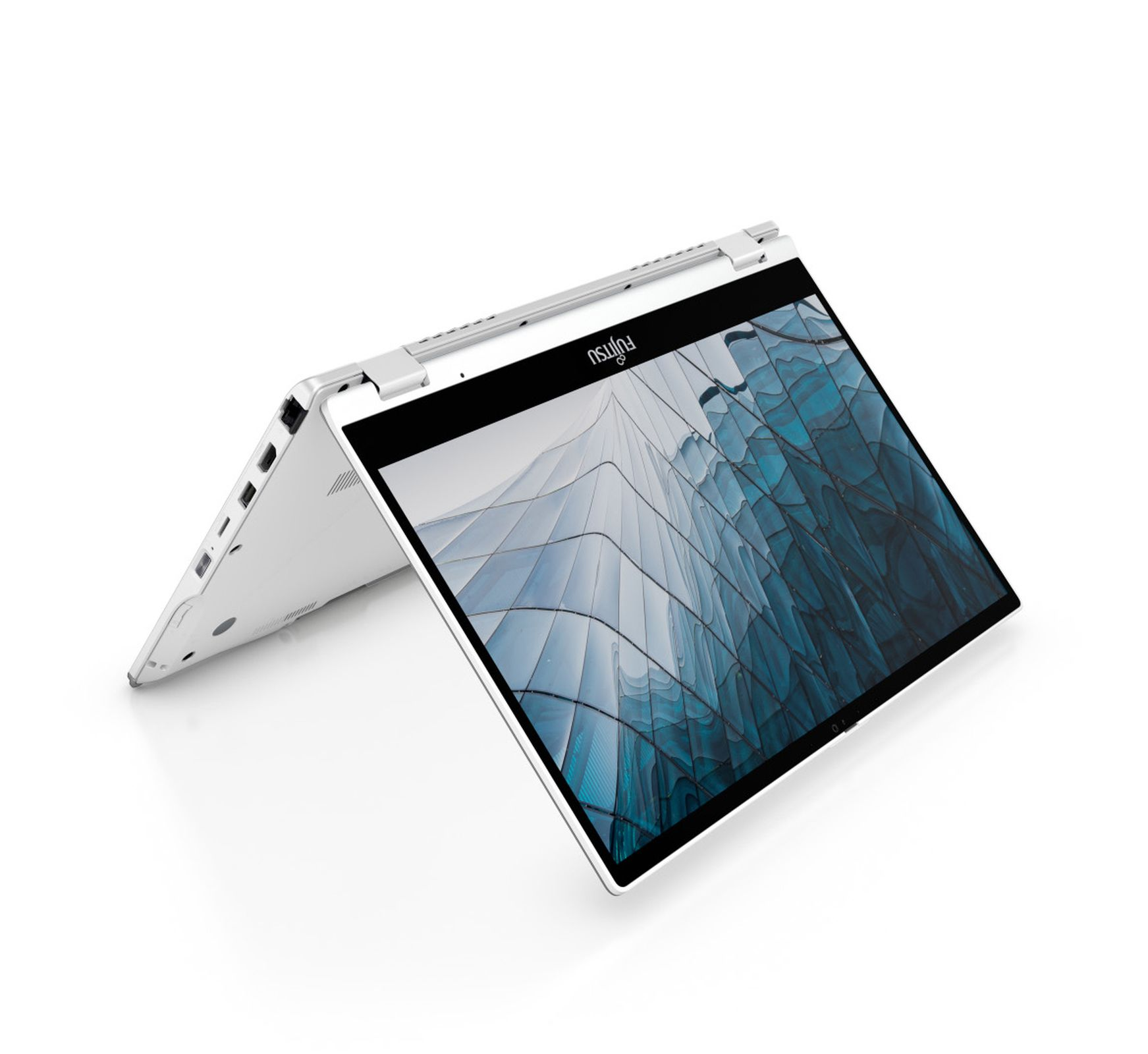 Laptop bianco, aperto, con schermo angolato, che mostra un paesaggio urbano.