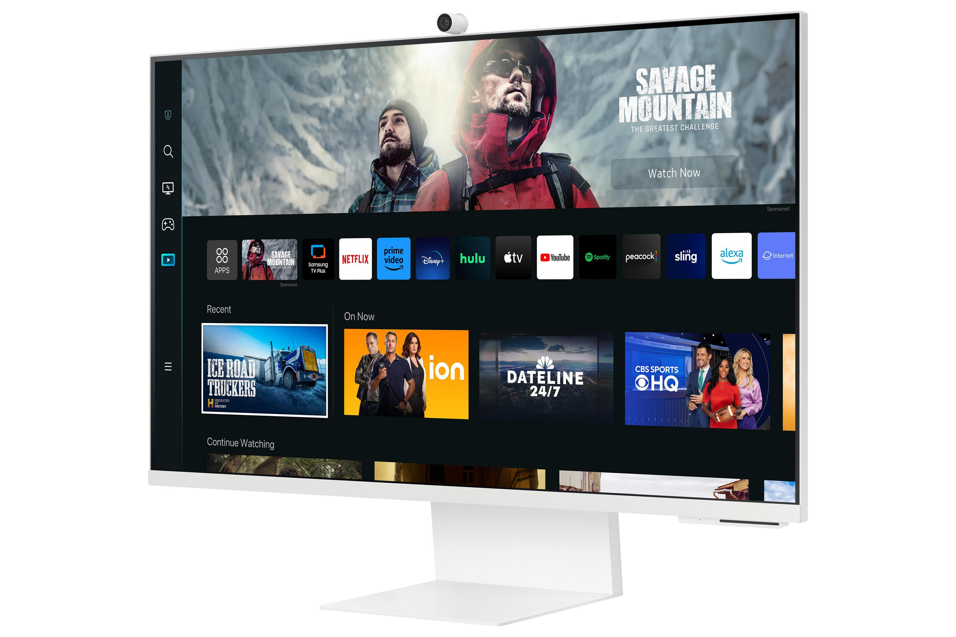 Un grande monitor bianco che mostra app di streaming e un film. Una fotocamera è in alto e un supporto bianco lo sostiene.