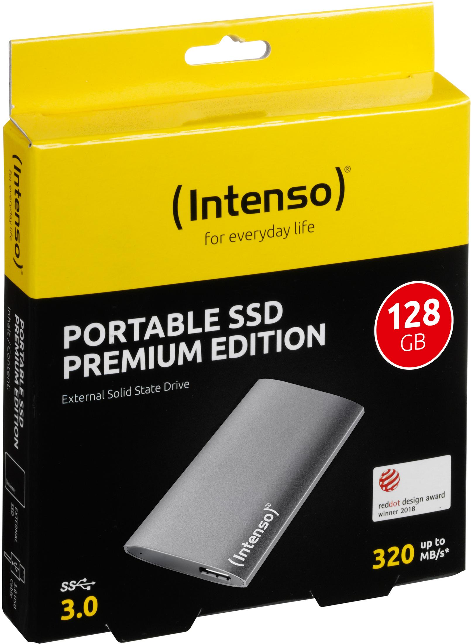 Boîte SSD portable : noire et jaune avec texte. Le SSD est argenté, avec port USB.