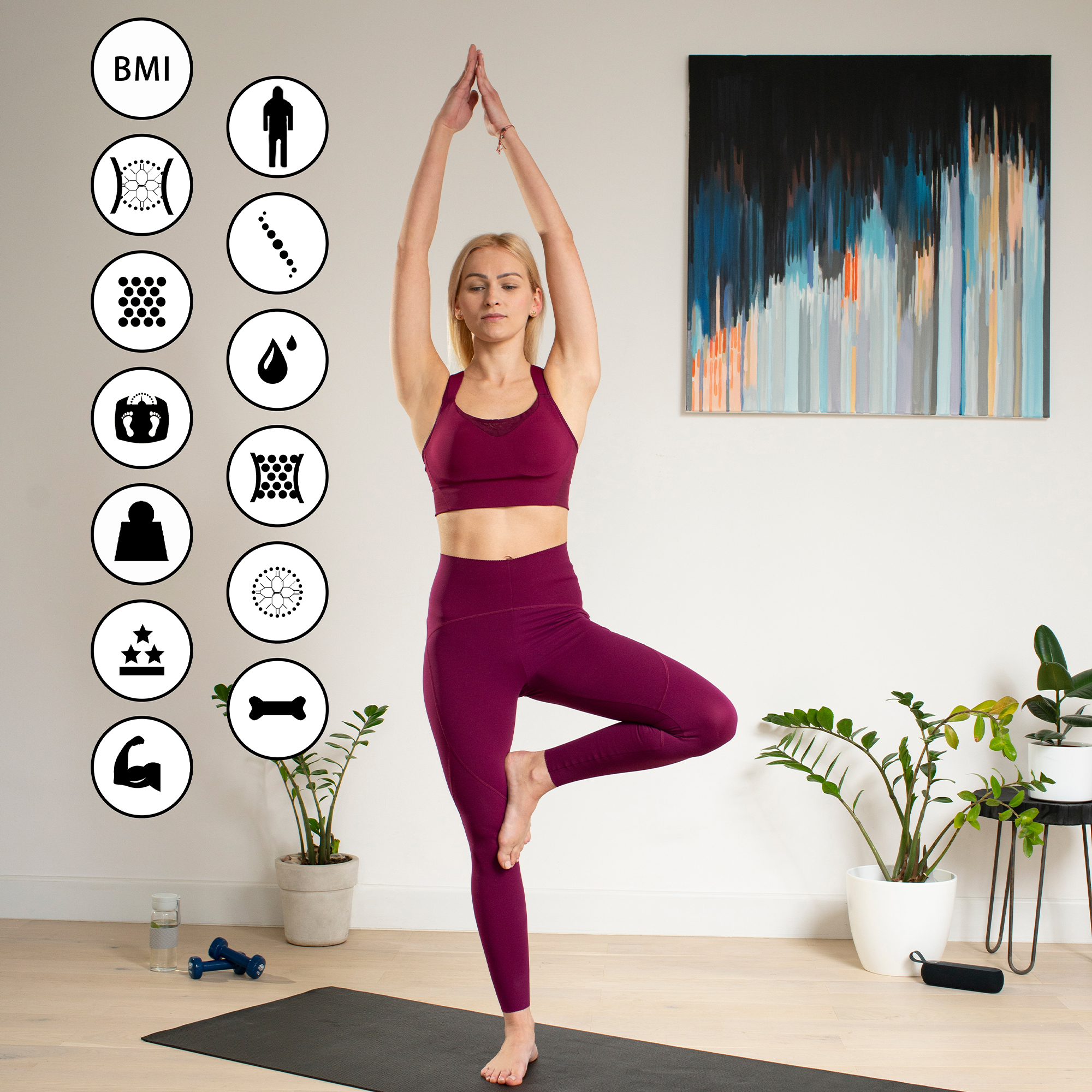 Kobieta w pozycji jogi. Ubrana w bordowy strój. Ikony jogi w tle. Biała ściana.