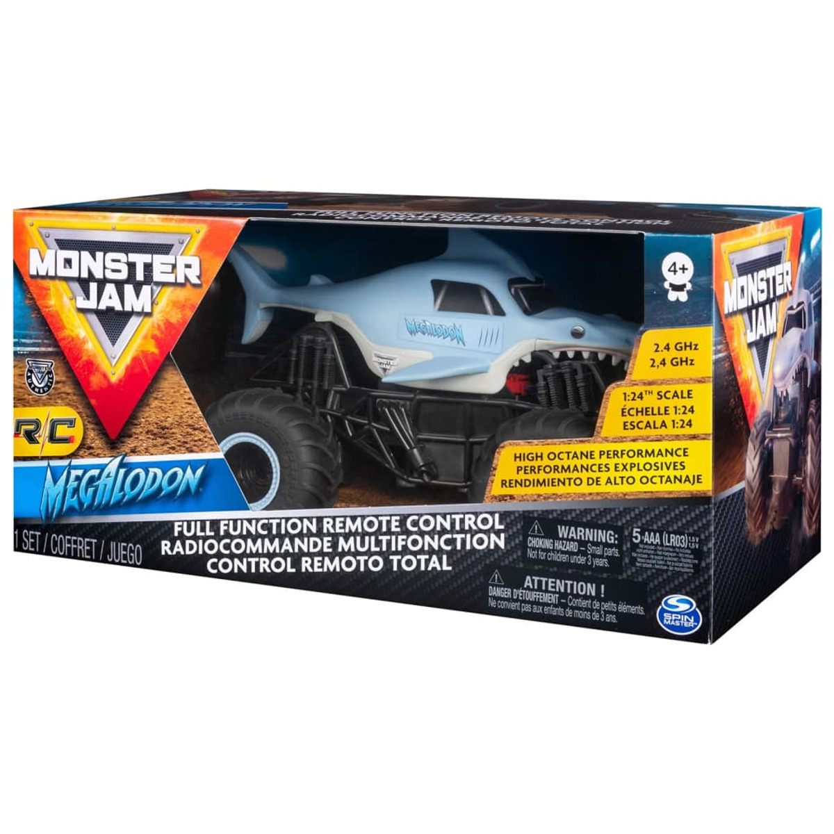 Embalaje de juguete Monster Jam con un camión tiburón azul, texto y advertencias.