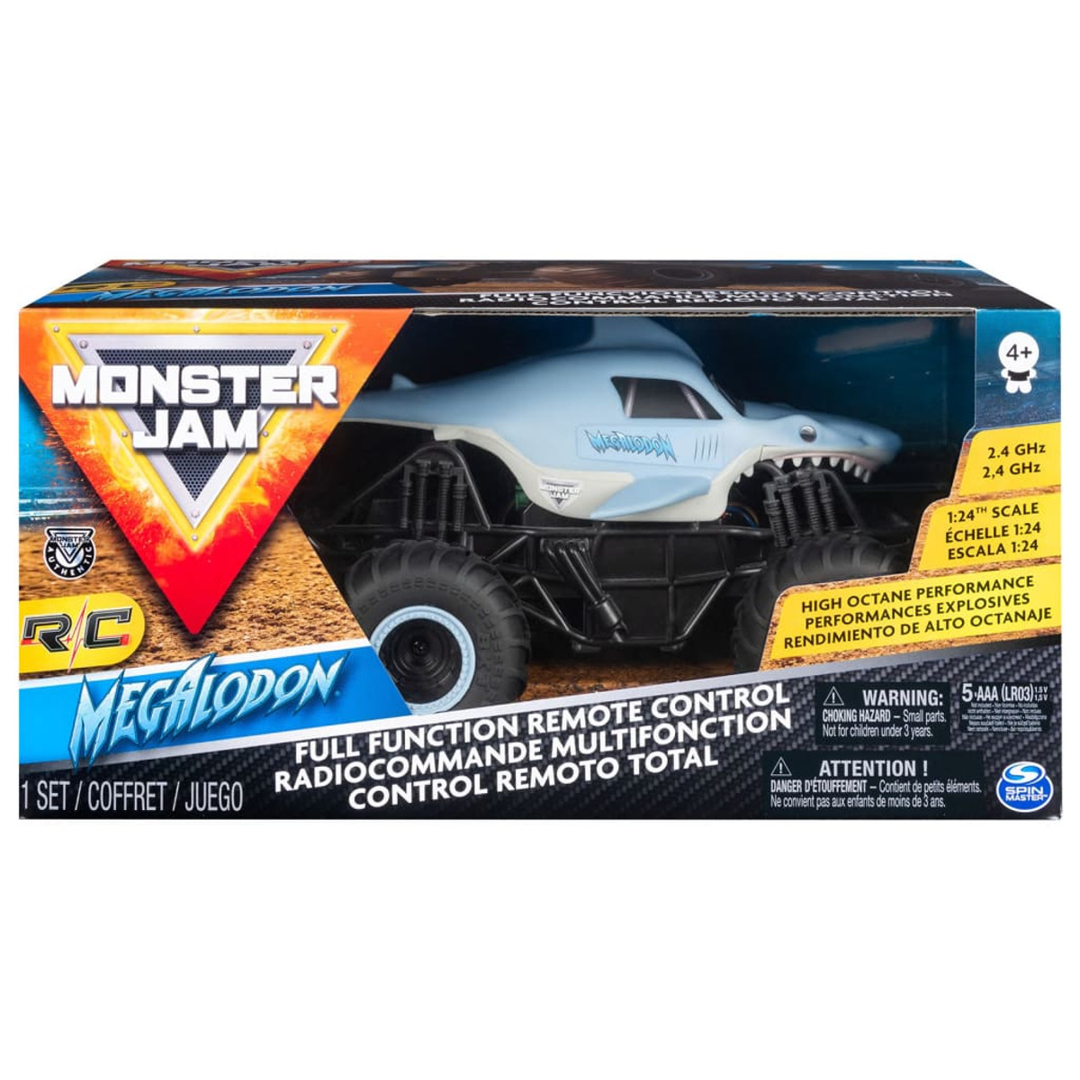 Embalaje de juguete Monster Jam con un camión tiburón azul, texto y advertencias.