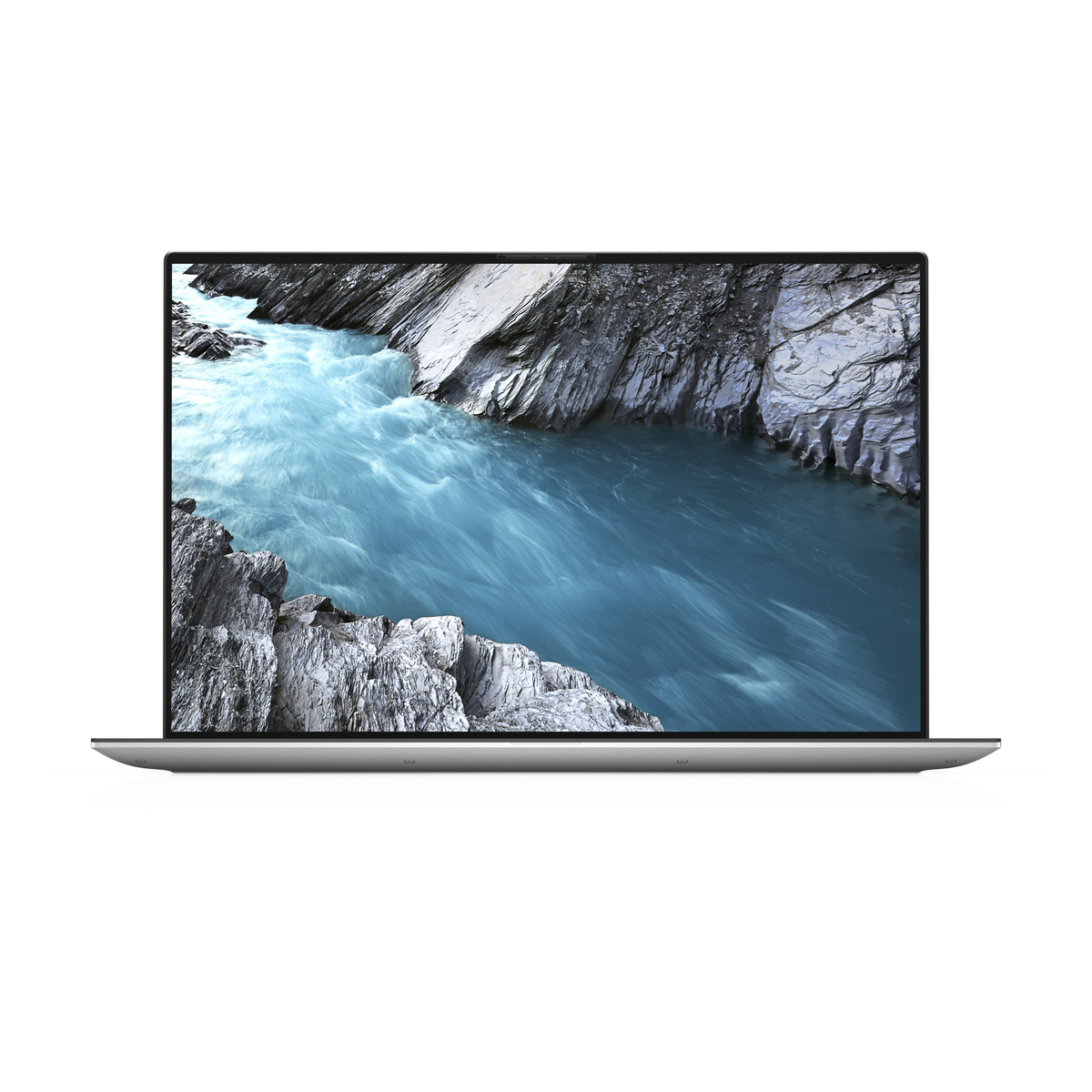 Ein Laptop auf weißer Oberfläche, das eine Ansicht von Wasser und Felsen zeigt. Der Bildschirm ist geöffnet.