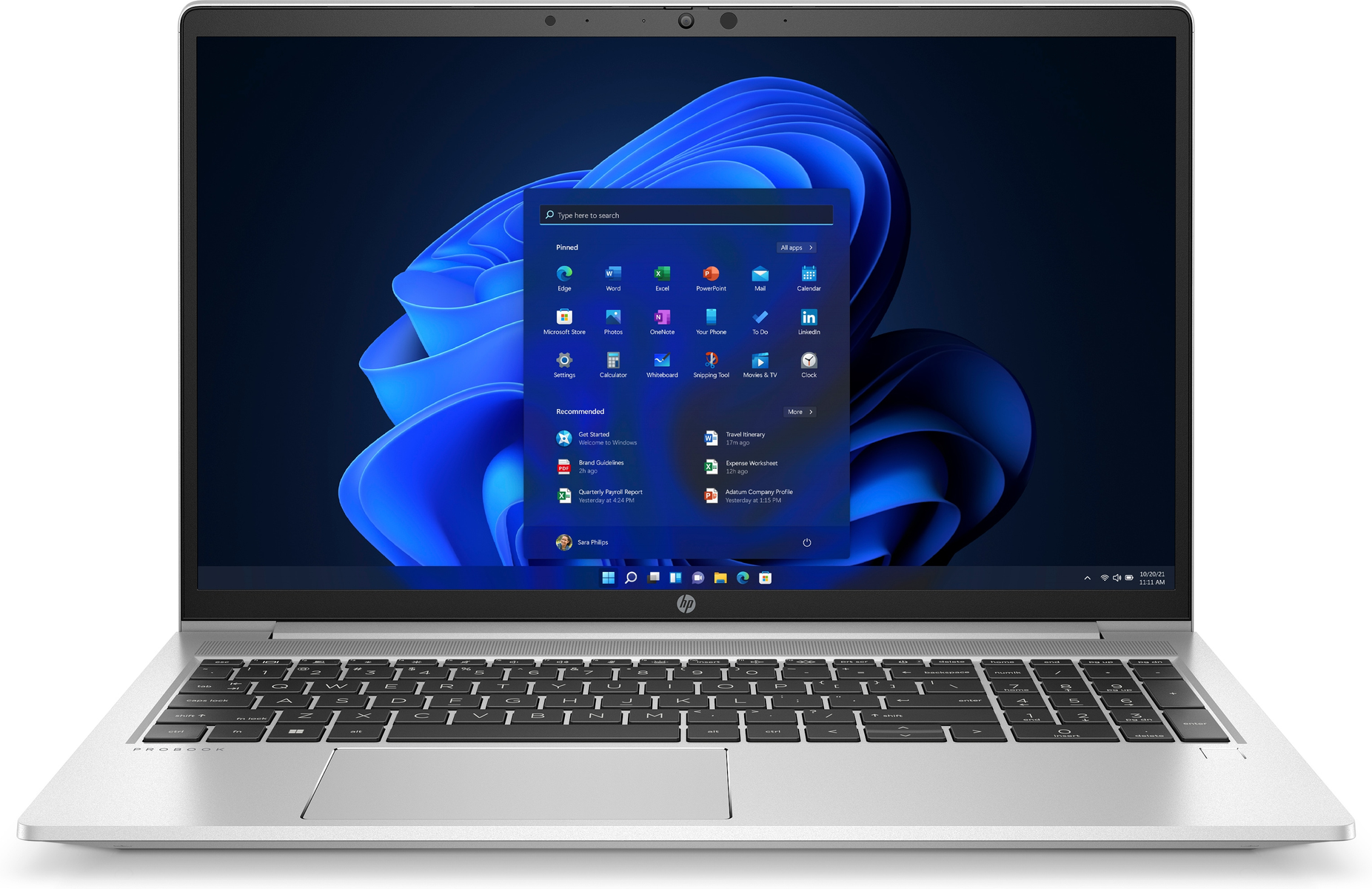 Silberner Laptop, offen, zeigt einen Windows 11 Desktop mit App-Symbolen auf dunklem blauem Hintergrund.