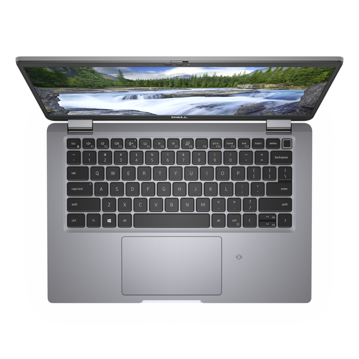 Portátil Dell, vista superior, abierto, mostrando teclado y pantalla. La pantalla muestra una cascada.