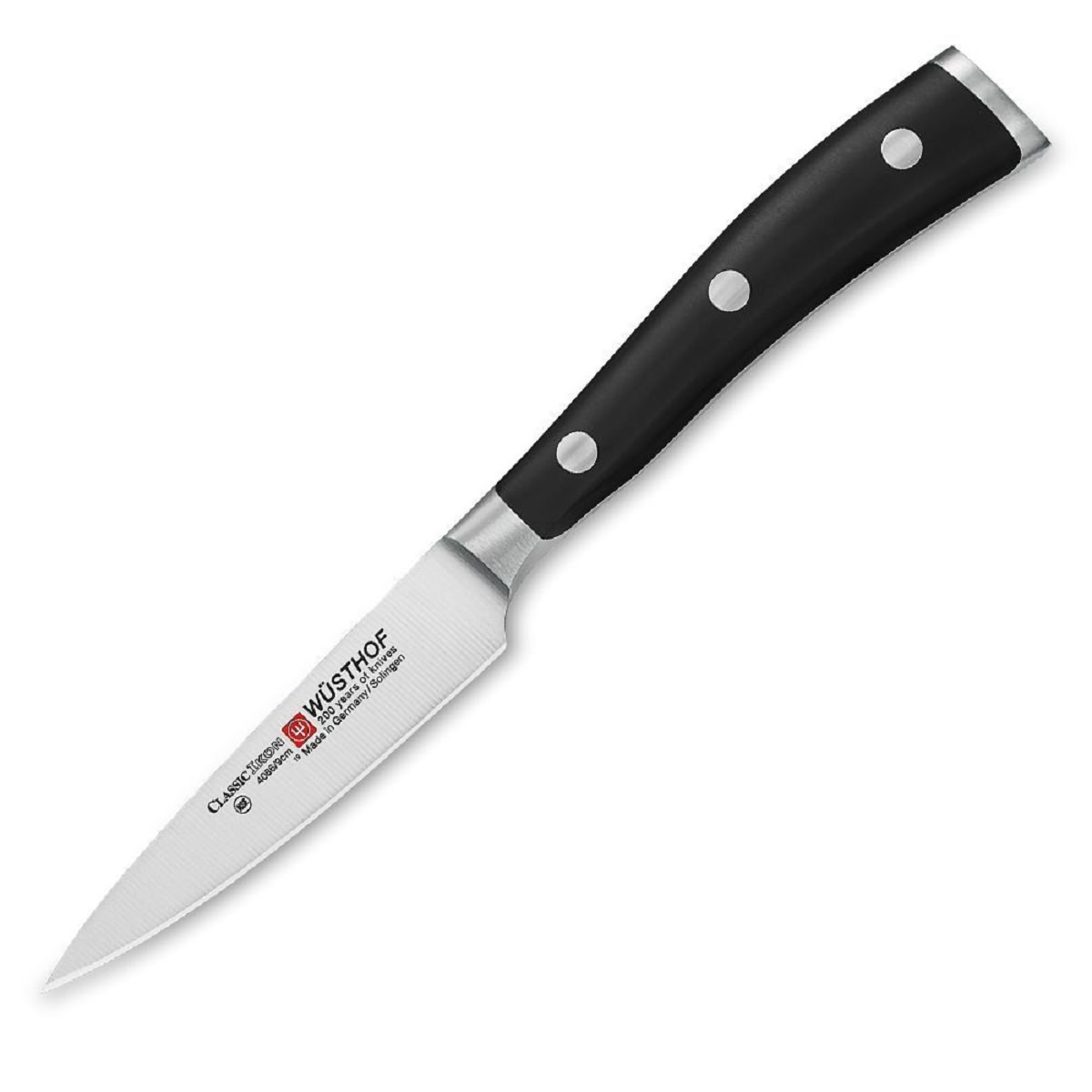 Wüsthof Classic Schälmesser auf Weiß. Schwarzer Griff, Silberzwinge, scharfe Klinge.