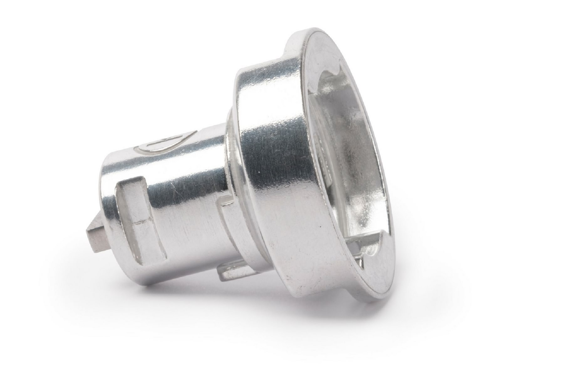 Srebrna metalowa część. Ma cylindryczny kształt z kilkoma otworami i mniejszy prostokątny kształt.