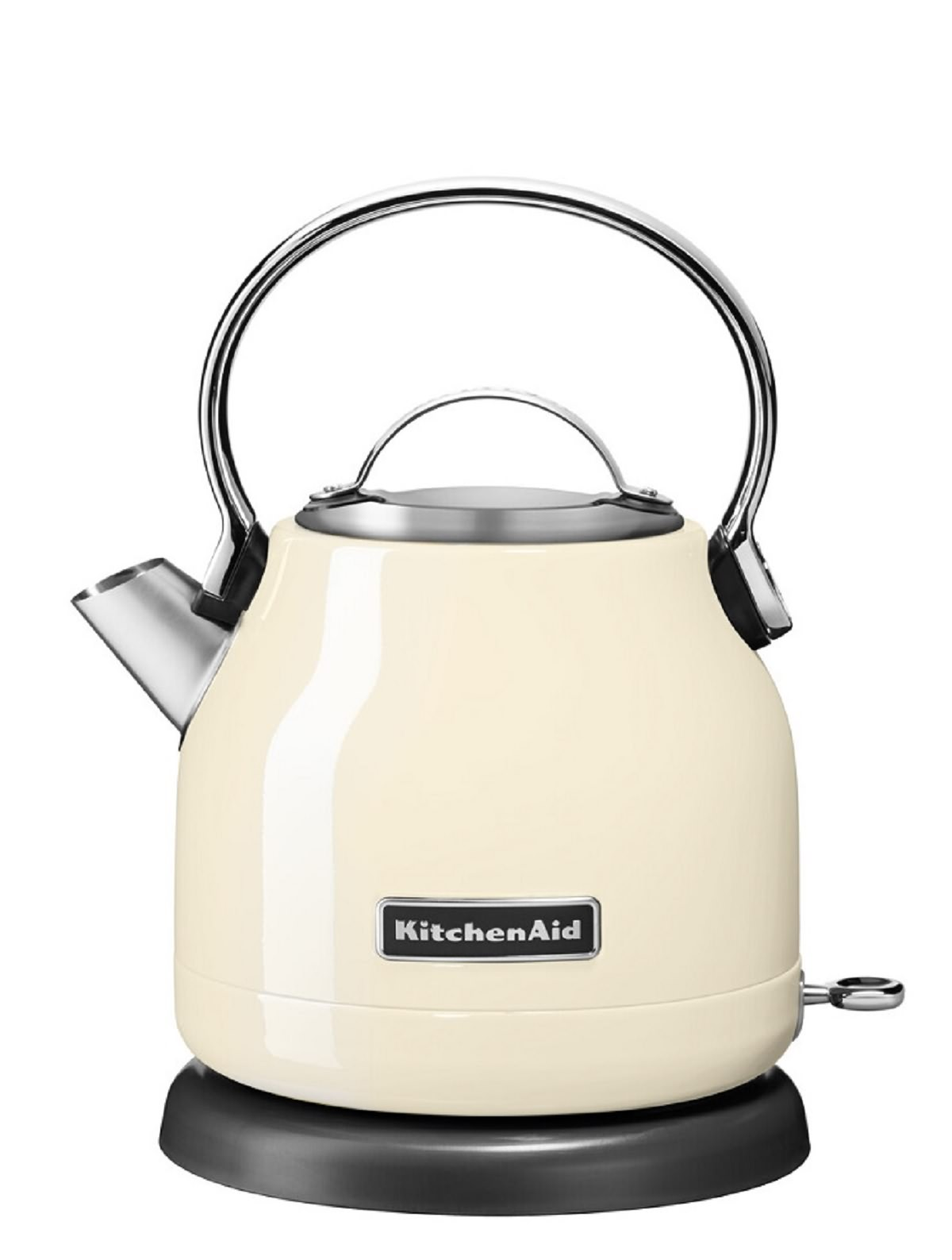 Cream KitchenAid kettle with a silver handle and spout. It sits on a black base.