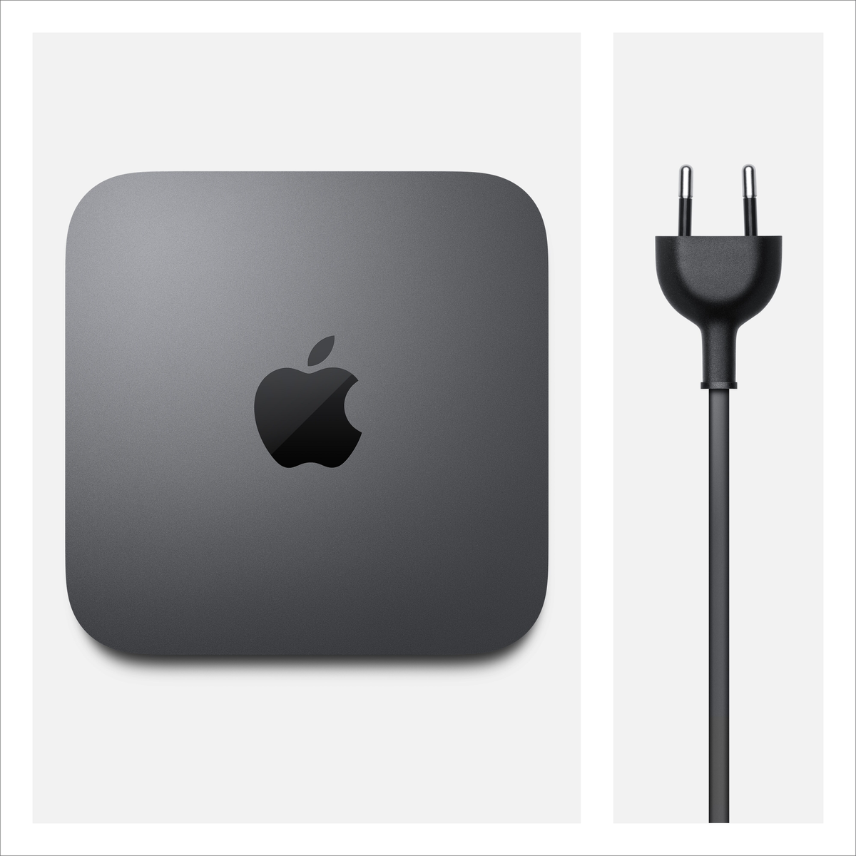 Apple Mac Mini e alimentatore. Mac Mini grigio con logo Apple. Sfondo bianco.
