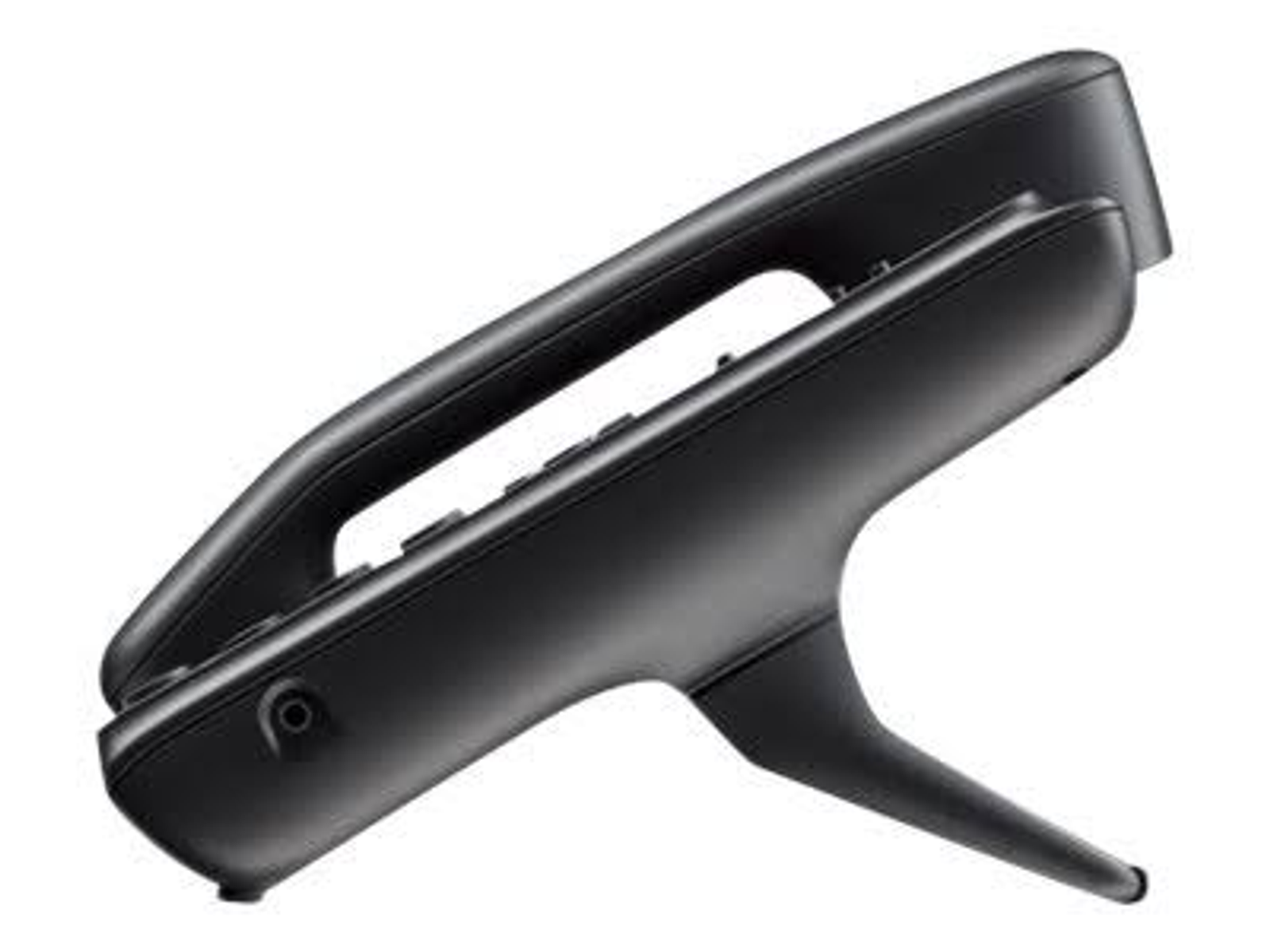 Ein schwarzes Festnetztelefon, auf einer weißen Oberfläche angewinkelt.