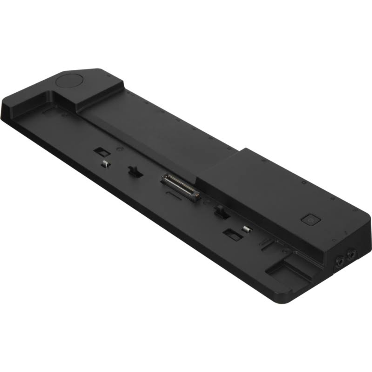 Schwarze Dockingstation mit mehreren Anschlüssen und Anschlüssen, aus einem Winkel auf einer weißen Oberfläche betrachtet.