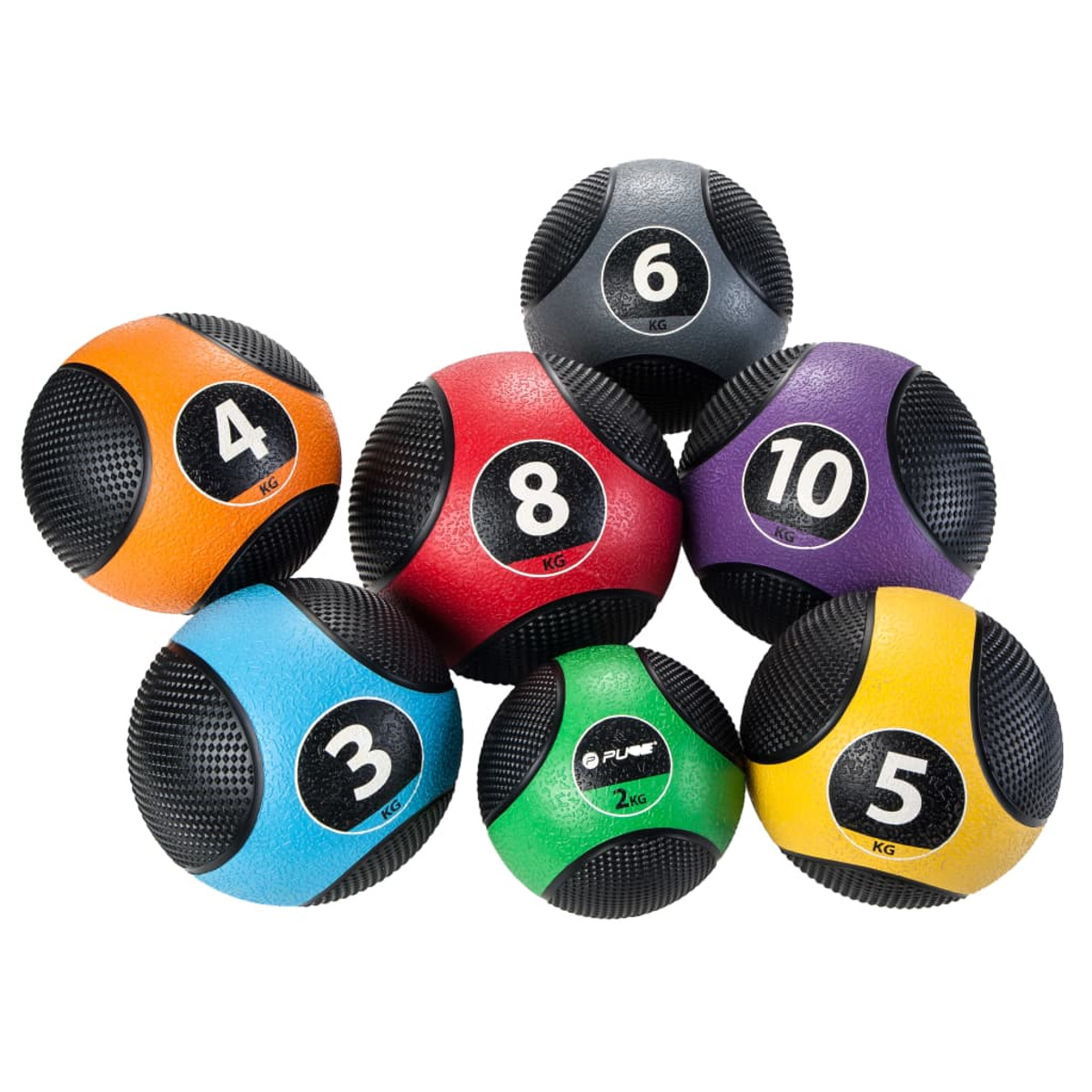 Sette palle mediche multicolori con pesi. Etichettate 3, 4, 5, 6, 8 e 10 kg. Sfondo bianco.