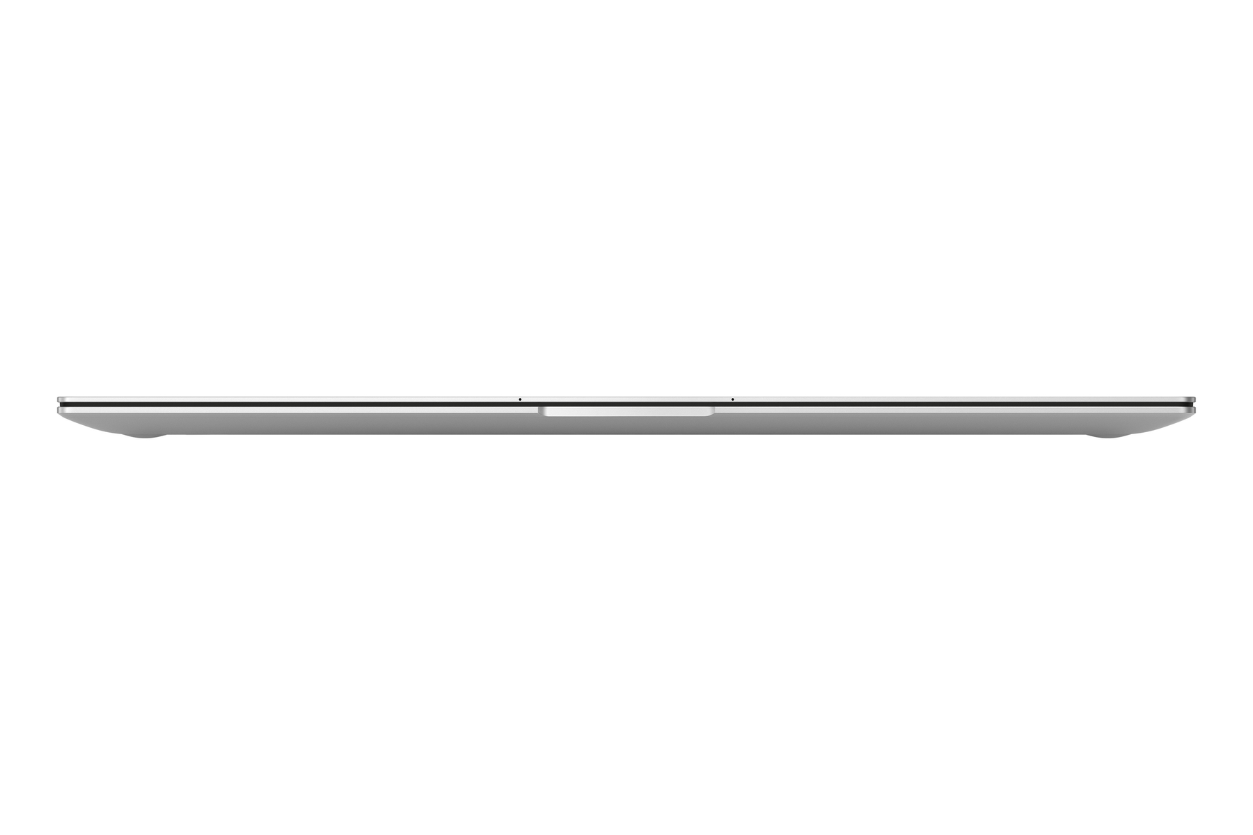 Ein dünner, silberner Laptop. Der Laptop ist geschlossen und von der Seite betrachtet.