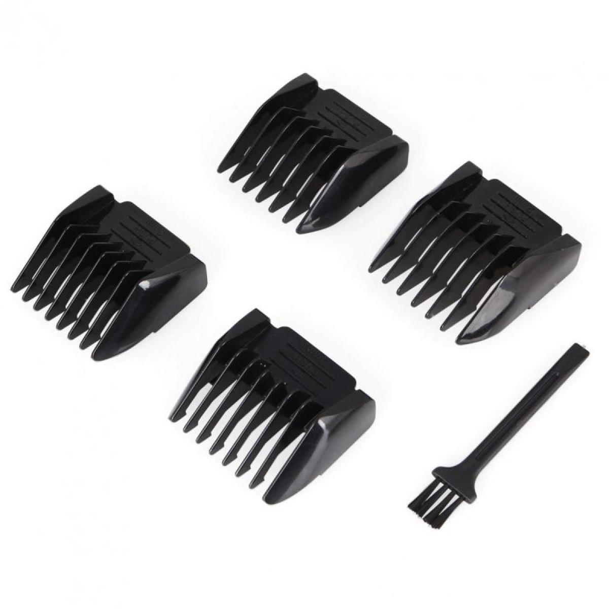 Cuatro protectores negros para cortapelos y un cepillo pequeño, sobre fondo blanco.