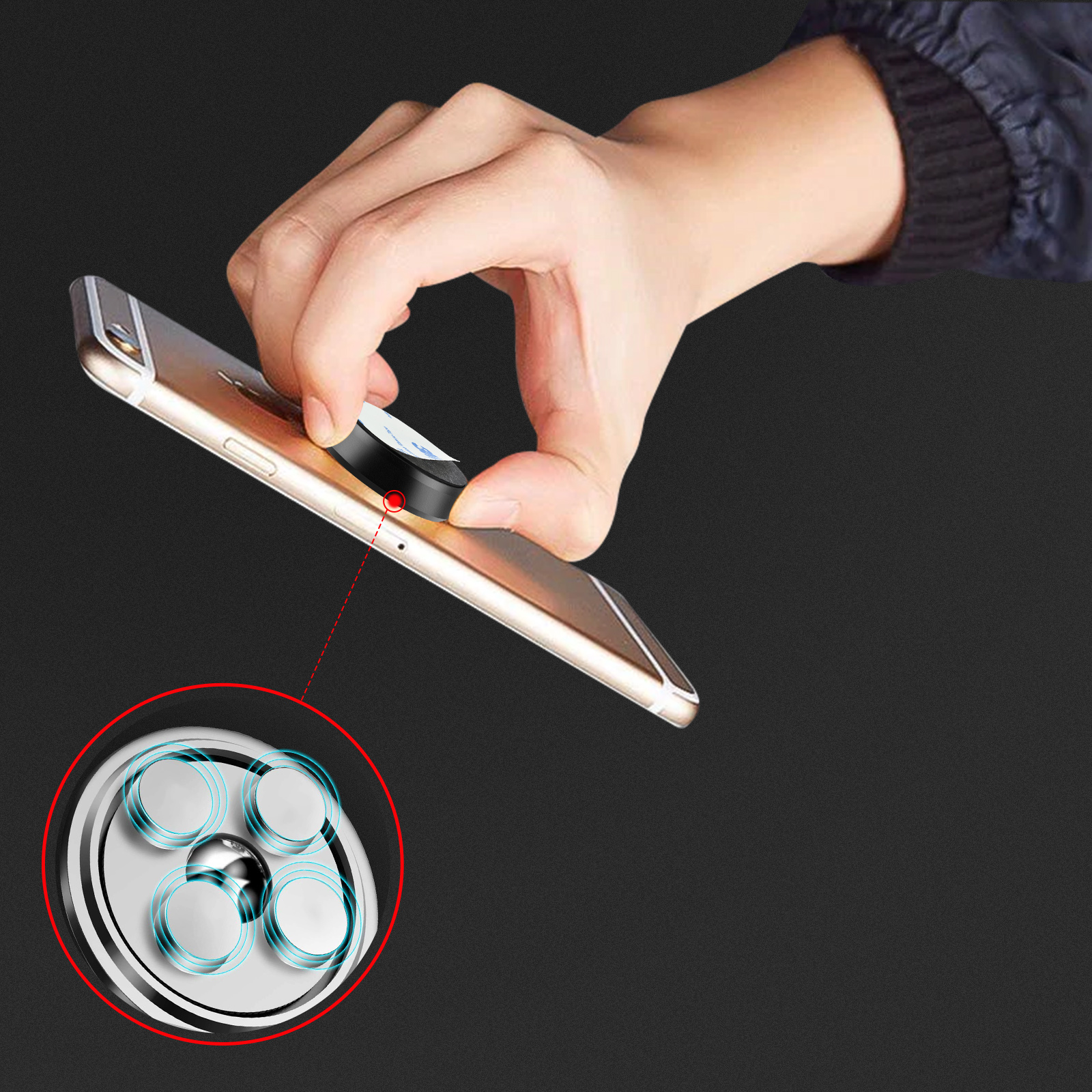 Eine Hand befestigt ein Telefon an einem magnetischen Telefonhalter. Der Halter hat Magnete.