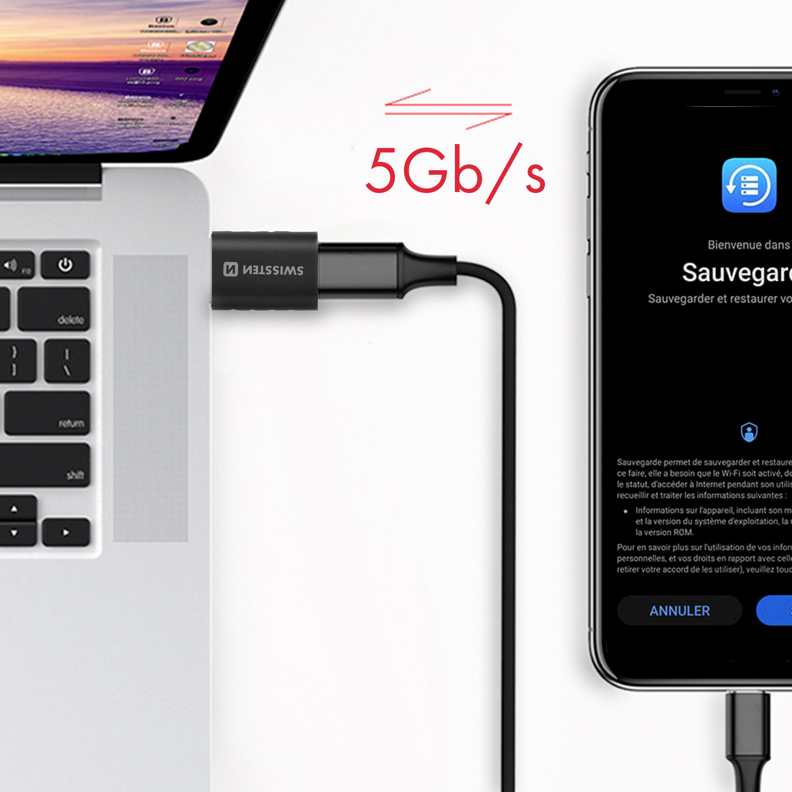 Un câble de chargement noir connecté à un ordinateur portable et à un téléphone avec le texte '5Gb/s'.