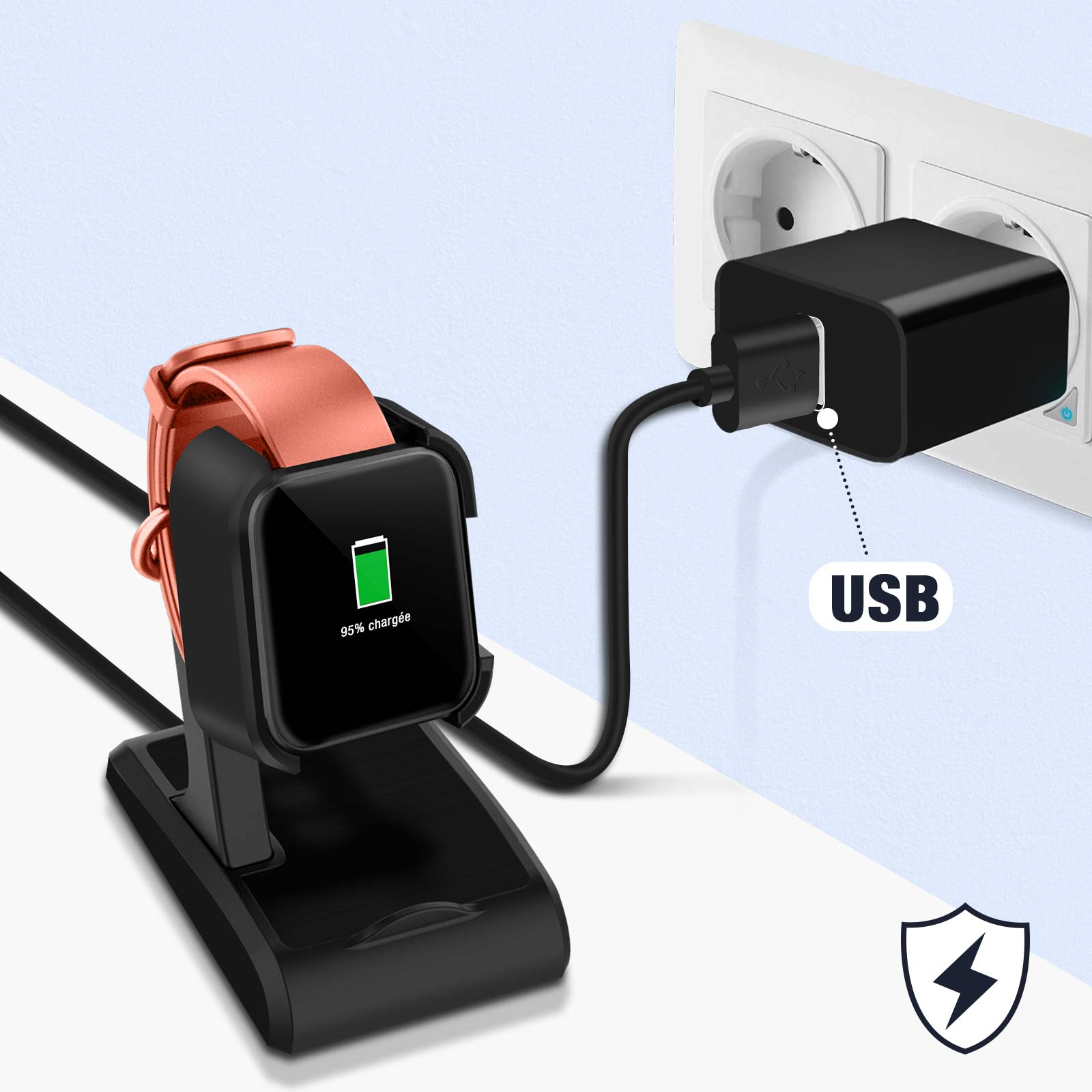 Smartwatch cargándose en soporte negro con cable USB conectado a enchufe.