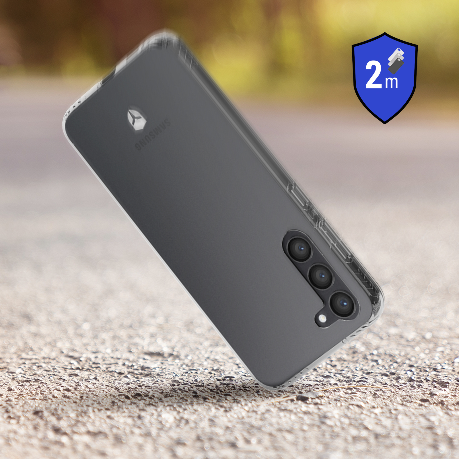 Coque transparente sur téléphone gris. La coque a un symbole de protection contre les chutes de 2m.