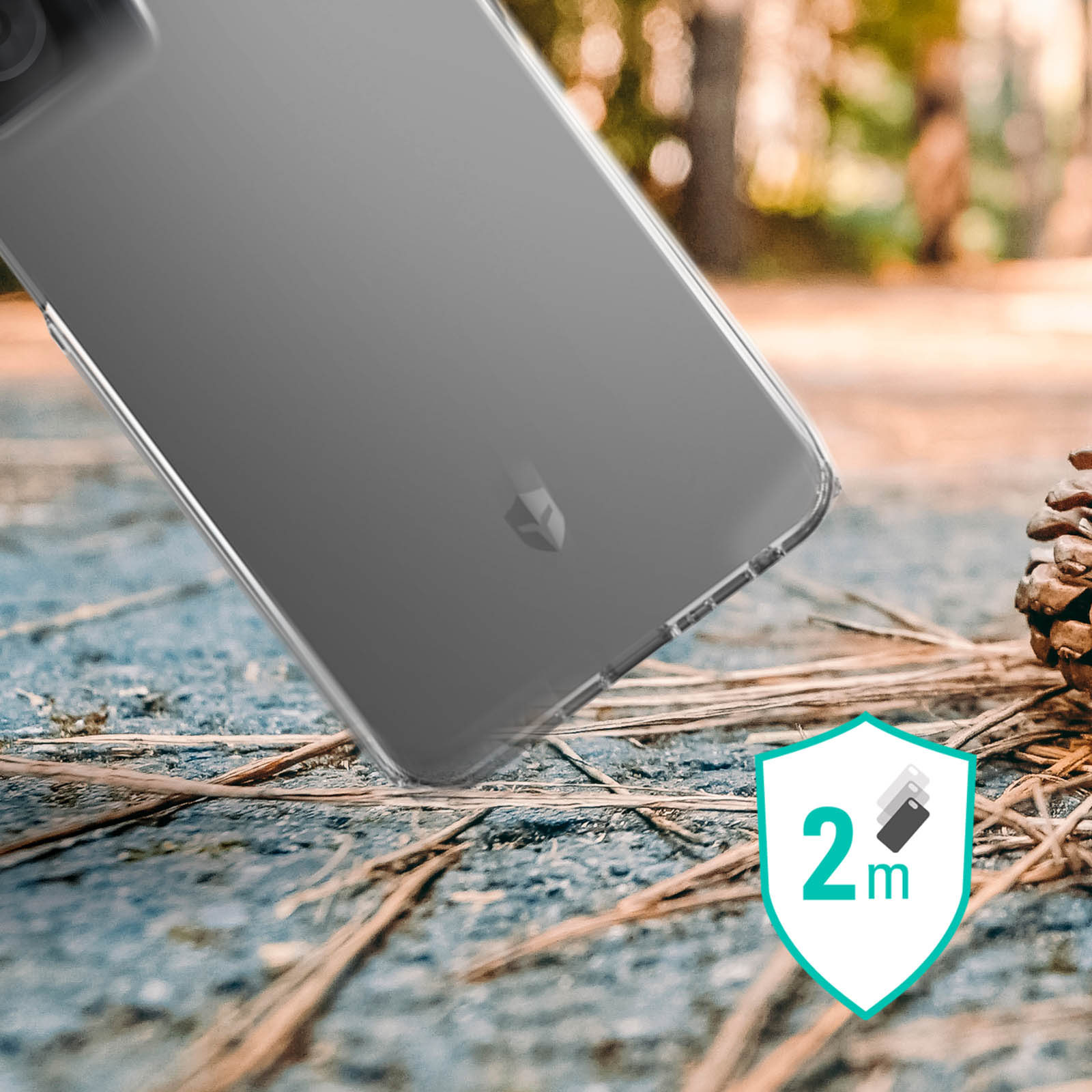 Un étui de téléphone transparent sur une surface en bois. Une icône de protection est visible.