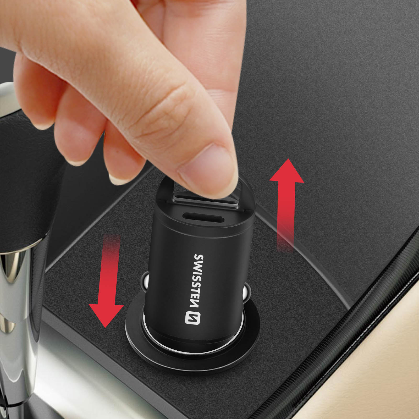 Schwarzes USB-Kabel mit einer Ladestation. Weißer Hintergrund.