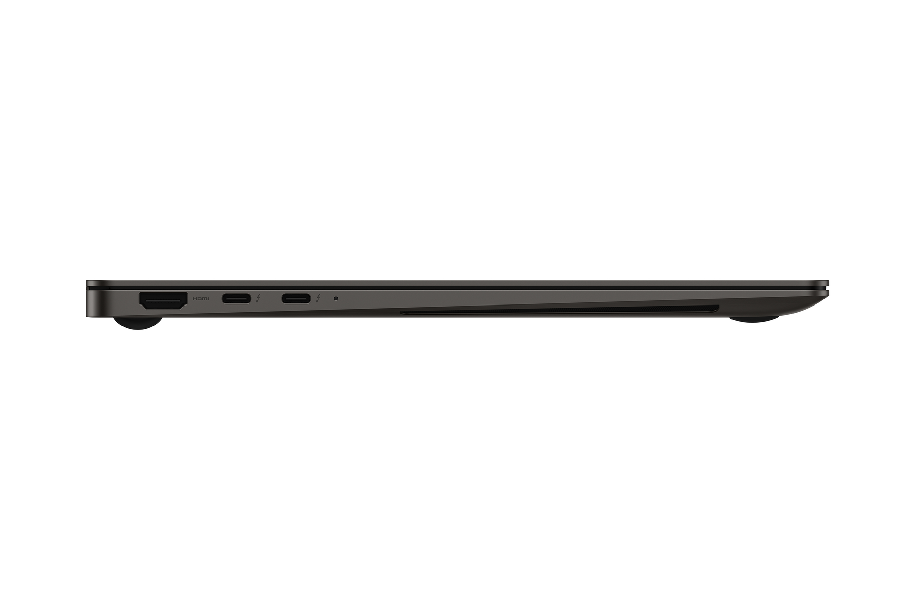 Ein dünner, dunkler Laptop wird von der Seite gezeigt, mit Anschlüssen und dem Bildschirmrand sichtbar.