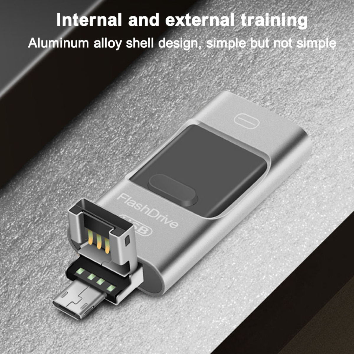 Ein silberner USB-Stick mit Micro-USB-Anschluss und Metallgehäuse.