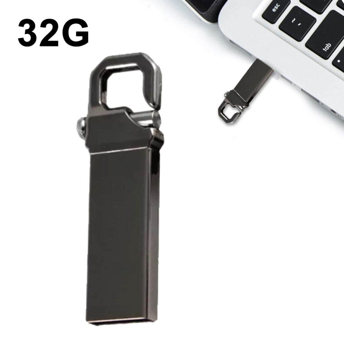 Schwarzes USB-Laufwerk neben einer Laptop-Tastatur. Text "32G" in der oberen linken Ecke.