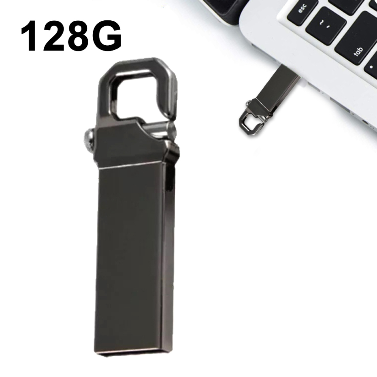 Ein silberner USB-Stick neben einer Laptop-Tastatur, mit '128G' auf dem Bild.