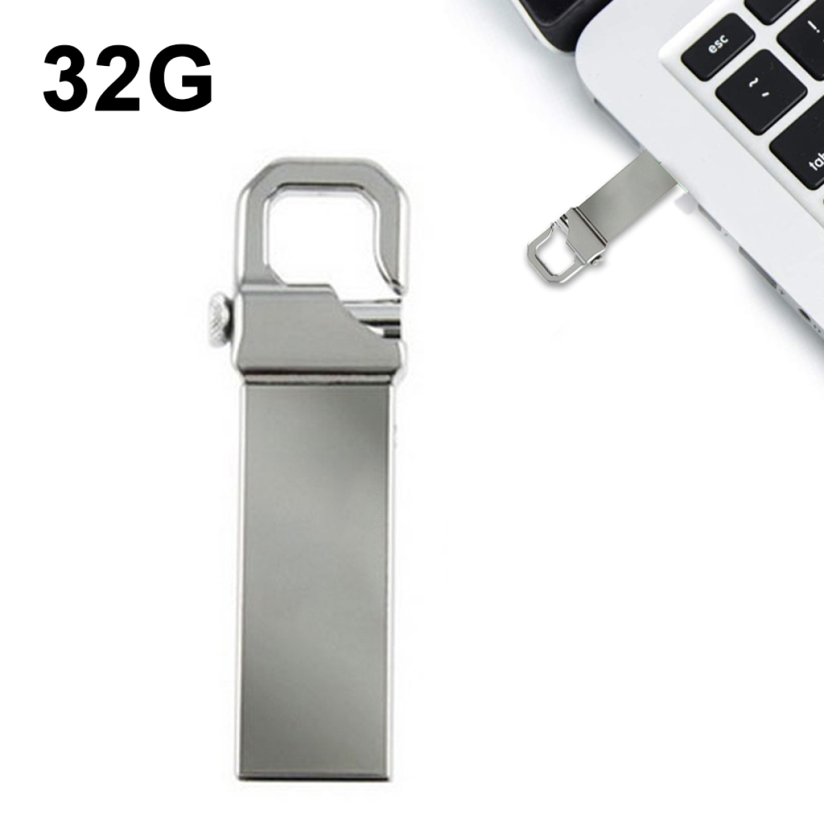 Ein silberner USB-Stick mit Haken neben einem Laptop, auf dessen Tastatur das Wort 'esc' steht.