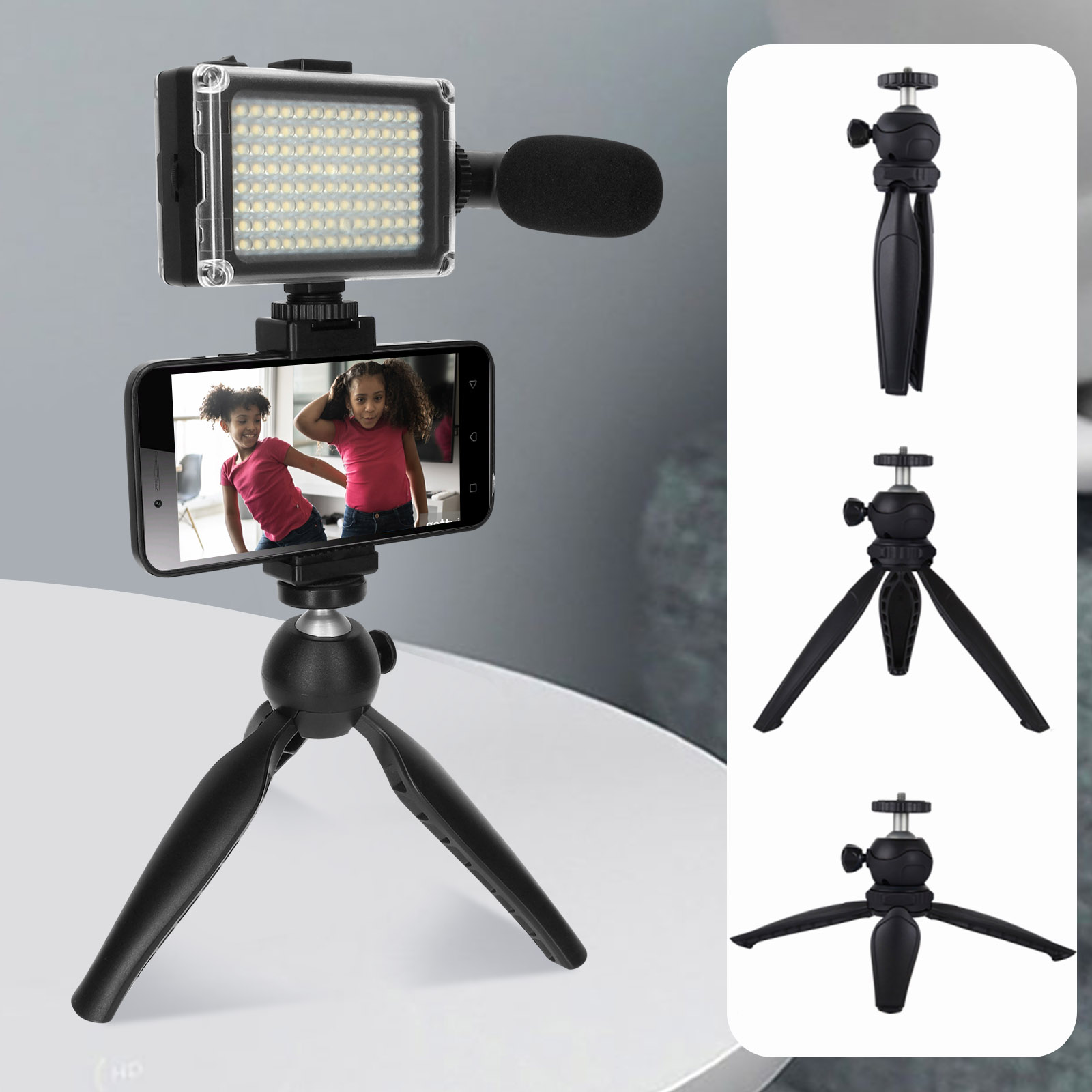 Smartphone montato su un treppiede con luce e microfono collegati.