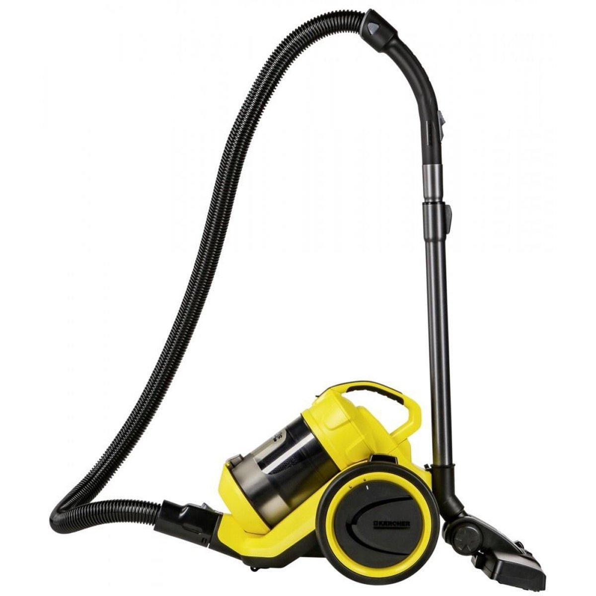 Un aspirapolvere giallo e nero con un lungo tubo flessibile e accessori per la pulizia.