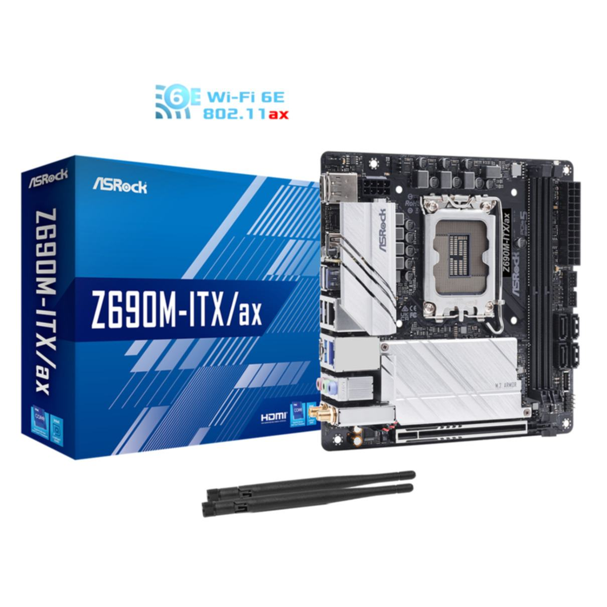 Scheda madre ASRock con scatola e antenne su una superficie bianca.