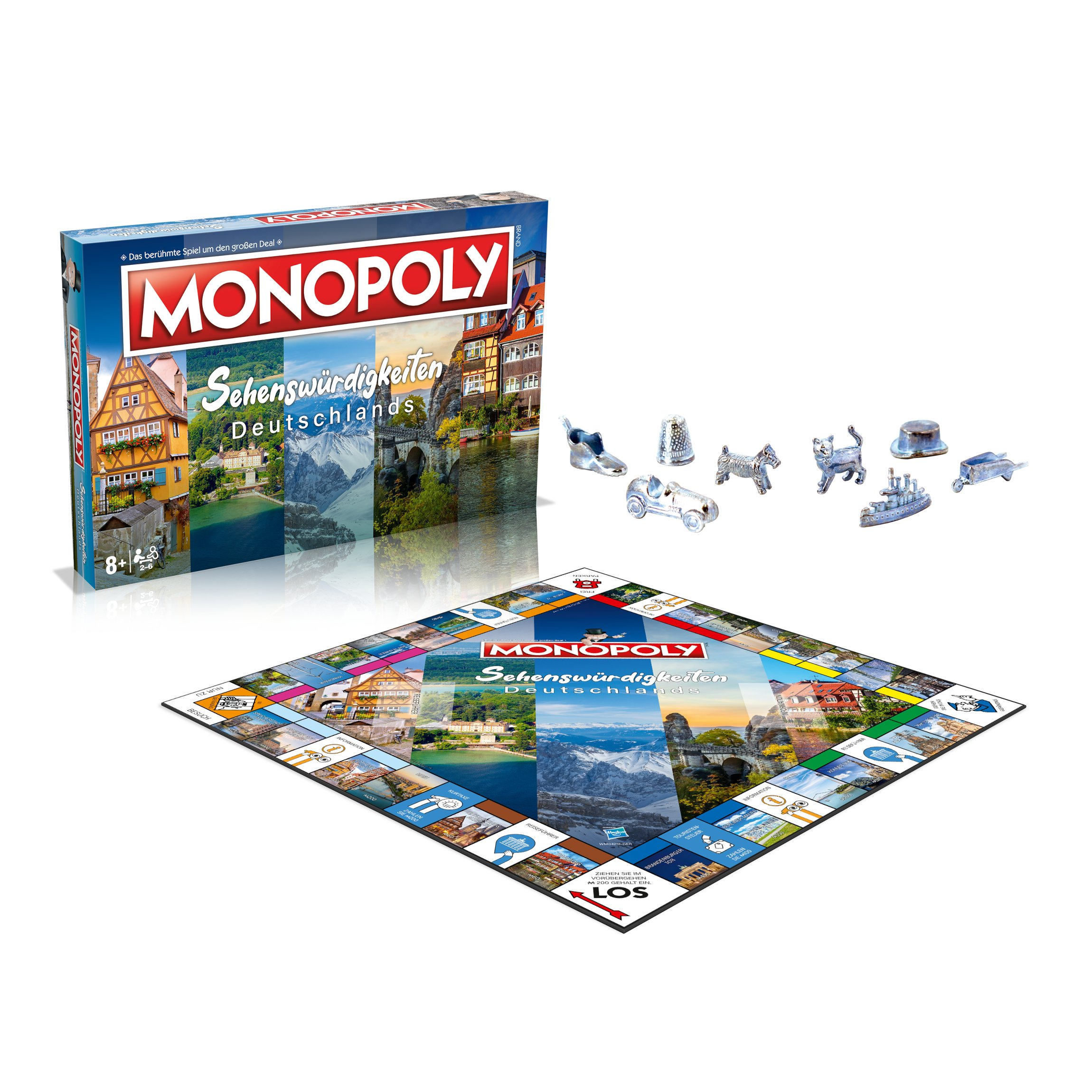 Monopoly-Brettspielbox und Spielfiguren. Das Brett ist sichtbar mit Stadtbildern.