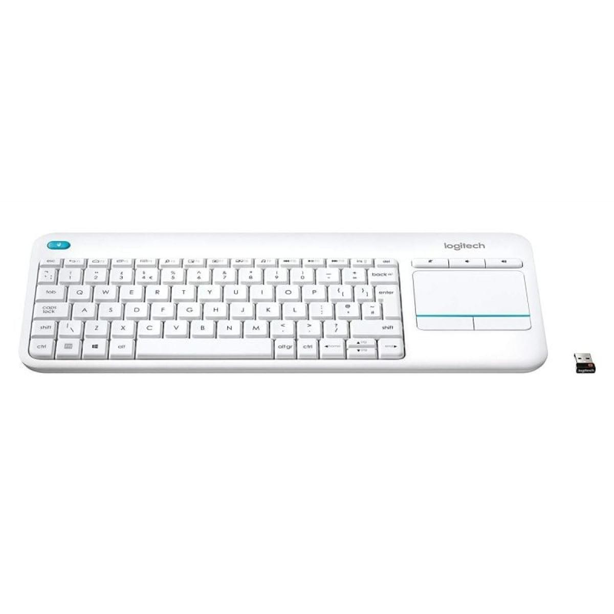 Un teclado blanco con un panel táctil y un receptor USB.
