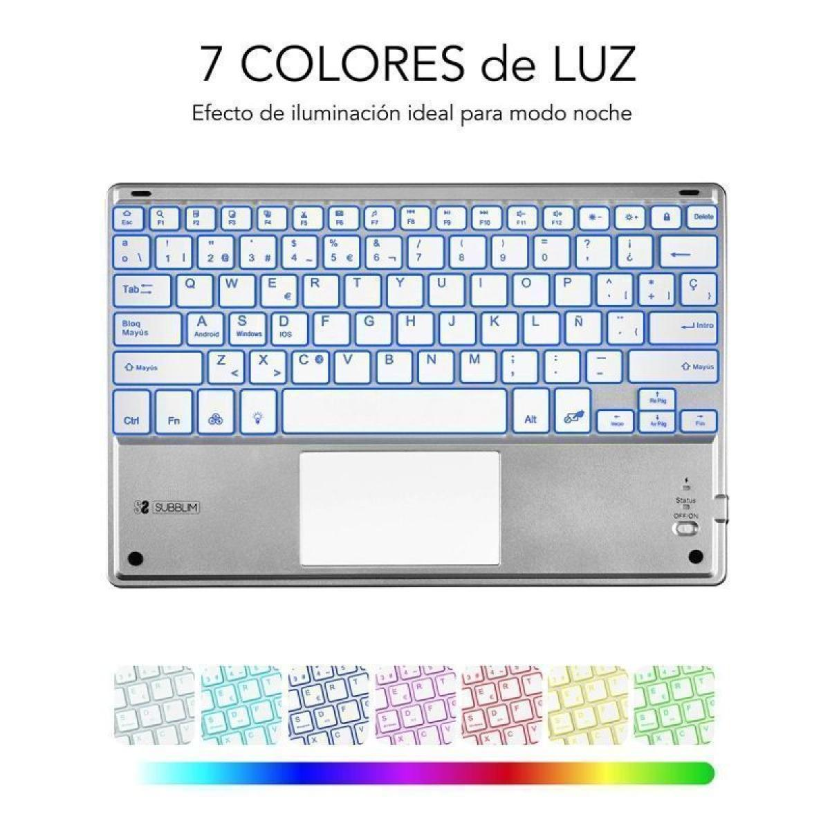 Teclado plateado con teclas iluminadas, panel táctil y varias teclas de función. Texto: "7 COLORES".
