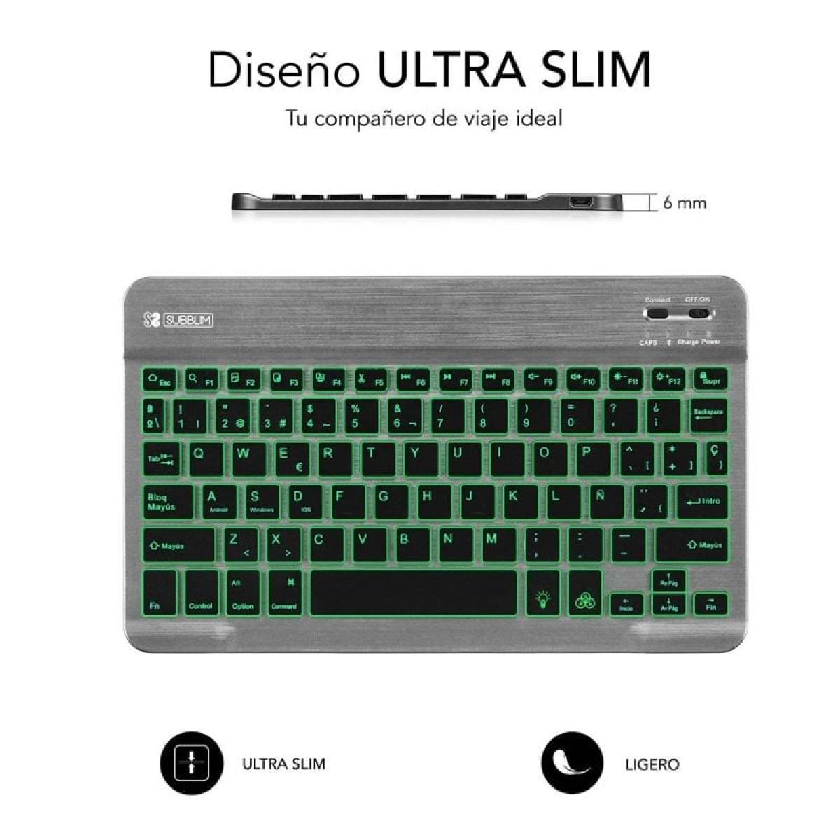 Teclado plateado ultra delgado con teclas retroiluminadas verdes, diseño compacto, texto 'Diseño ULTRA SLIM'.