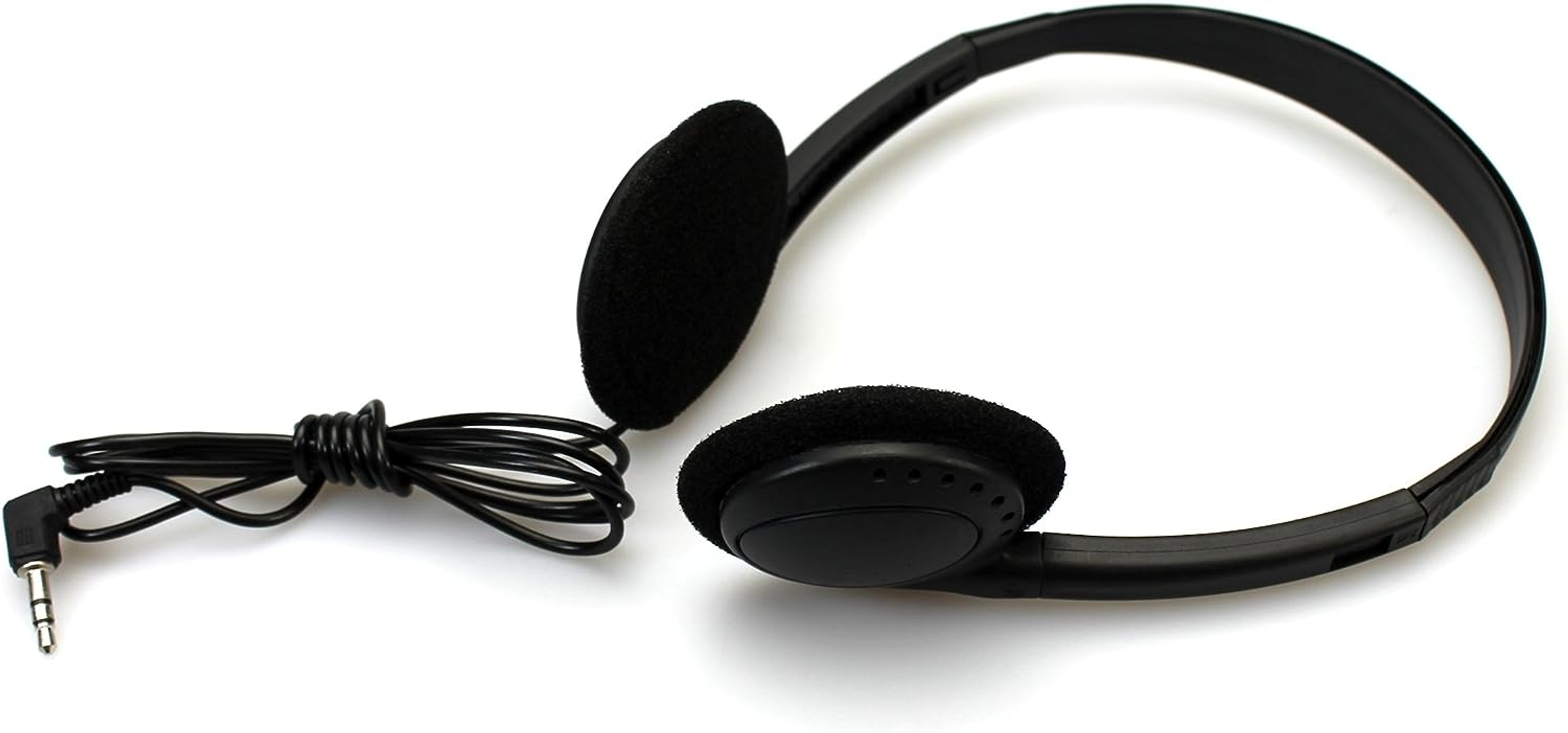 Black headphones with foam earcups and a cable. The cable is coiled up. White background.