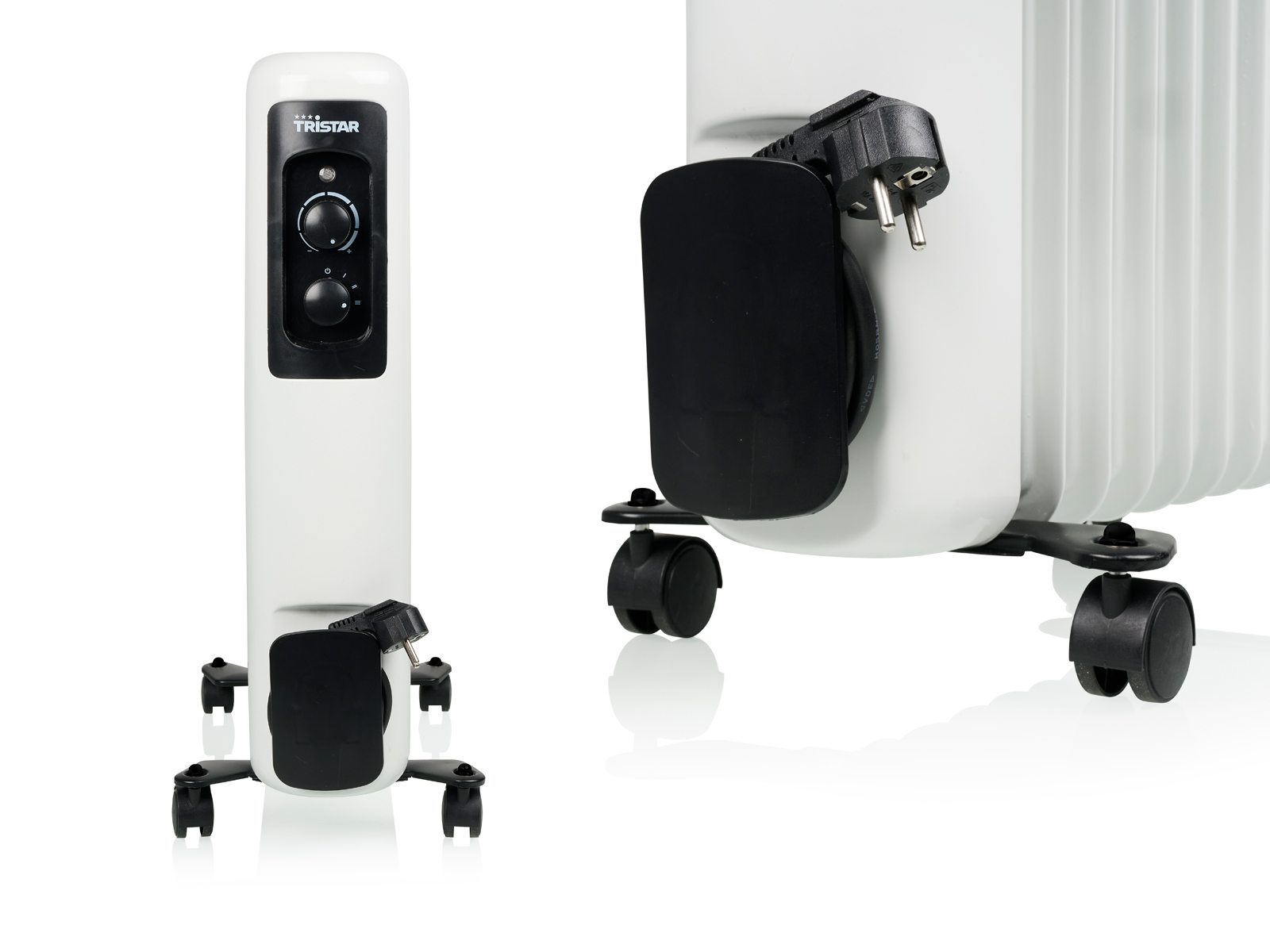 Biały grzejnik Tristar z elementami sterującymi i przewodem zasilającym. Czarne kółka u podstawy.