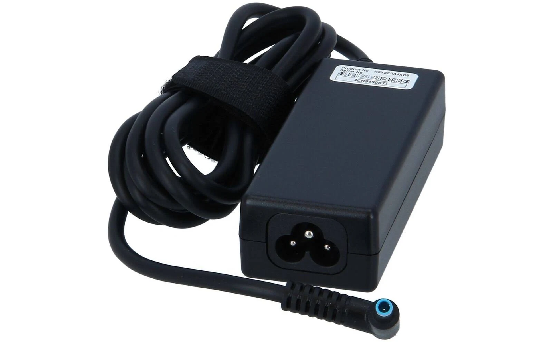 Black laptop power adapter. White background.