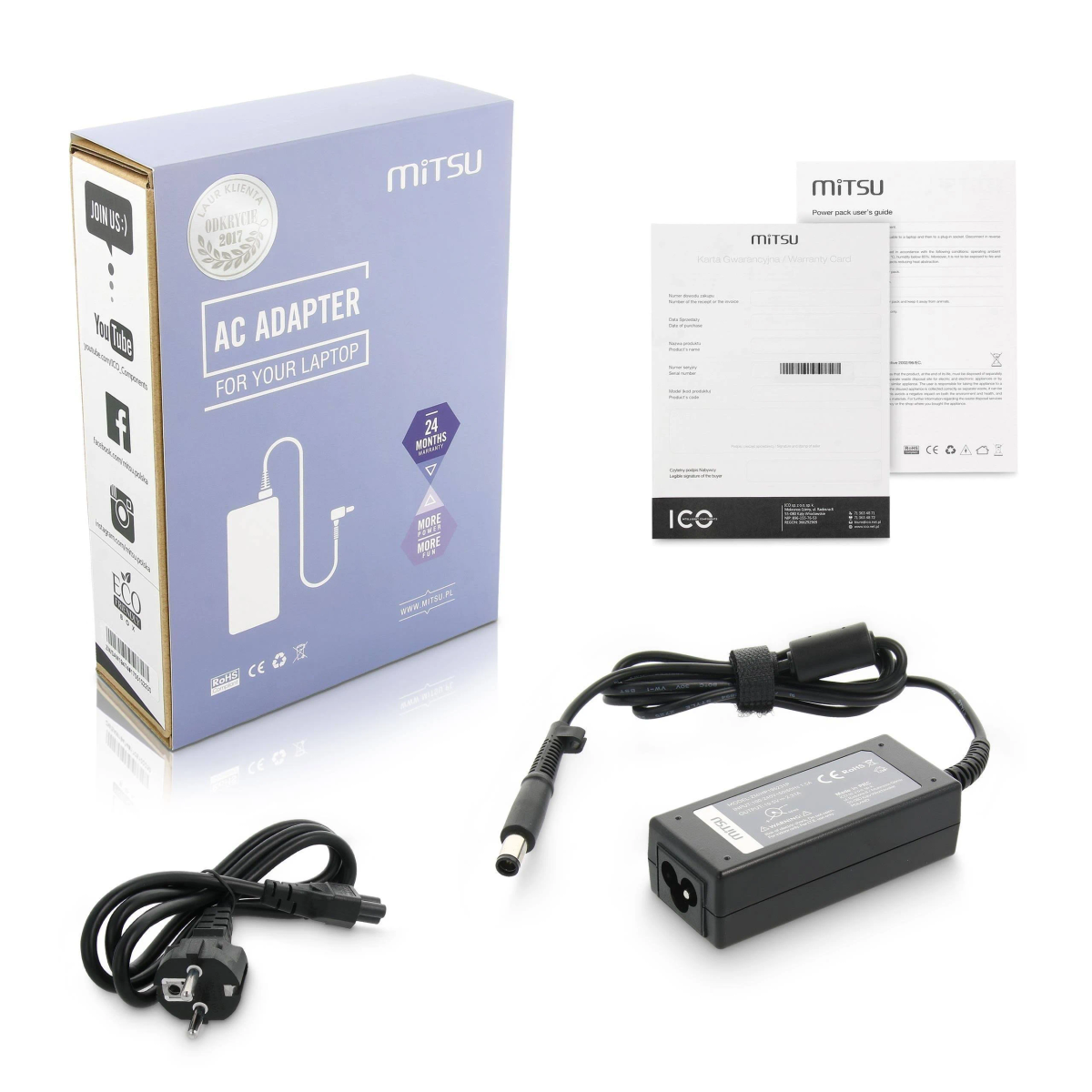 Mitsu AC-Adapter für Laptop in einer Box. Daneben das Netzkabel und eine Garantieanleitung.