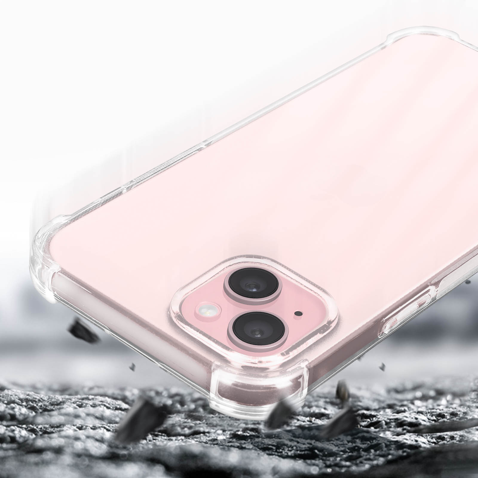 Telefono rosa in una custodia trasparente. La custodia è trasparente e sembra cadere, con frammenti attorno.