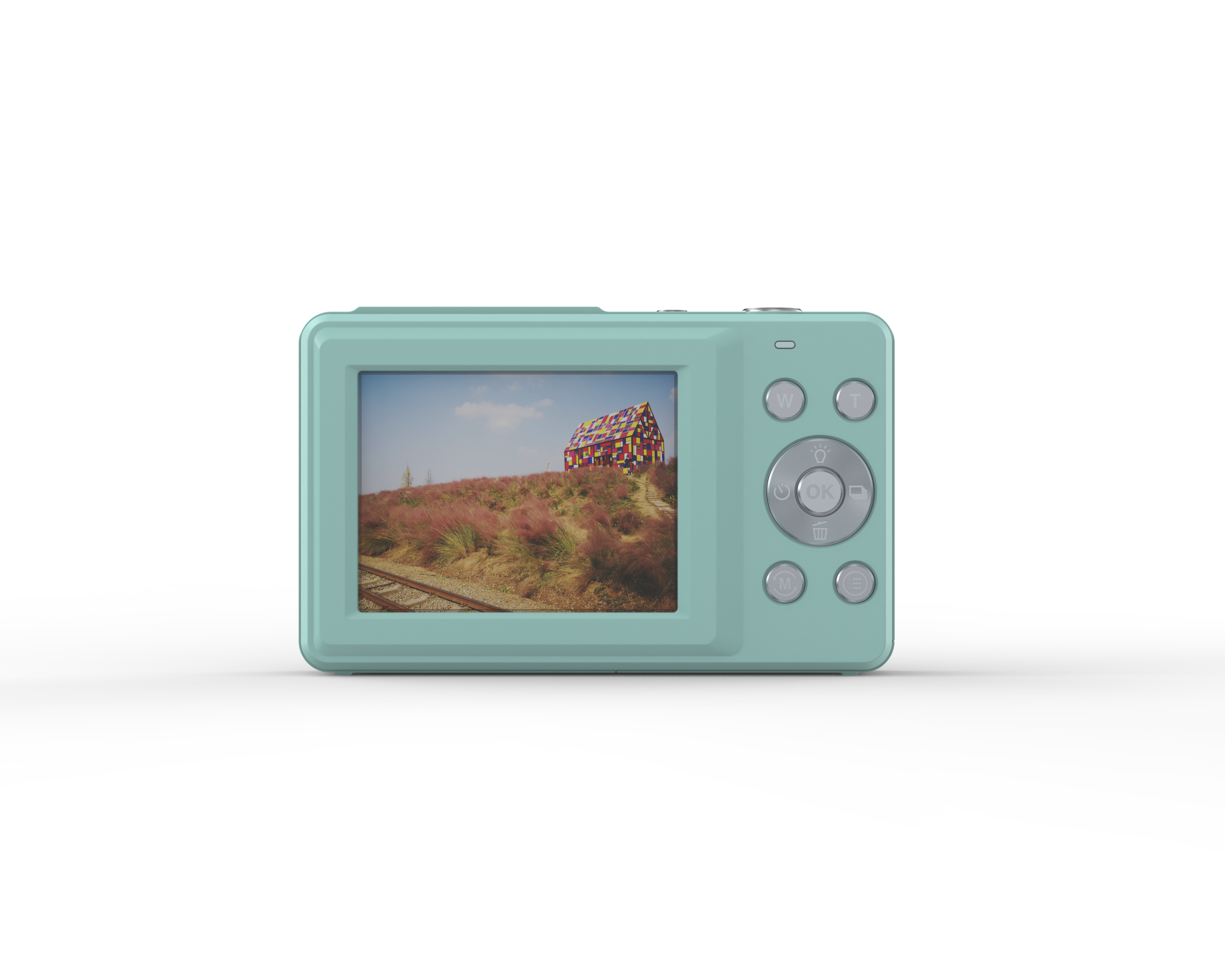 Miętowa kamera cyfrowa wyświetlająca obraz krajobrazu. Białe tło.