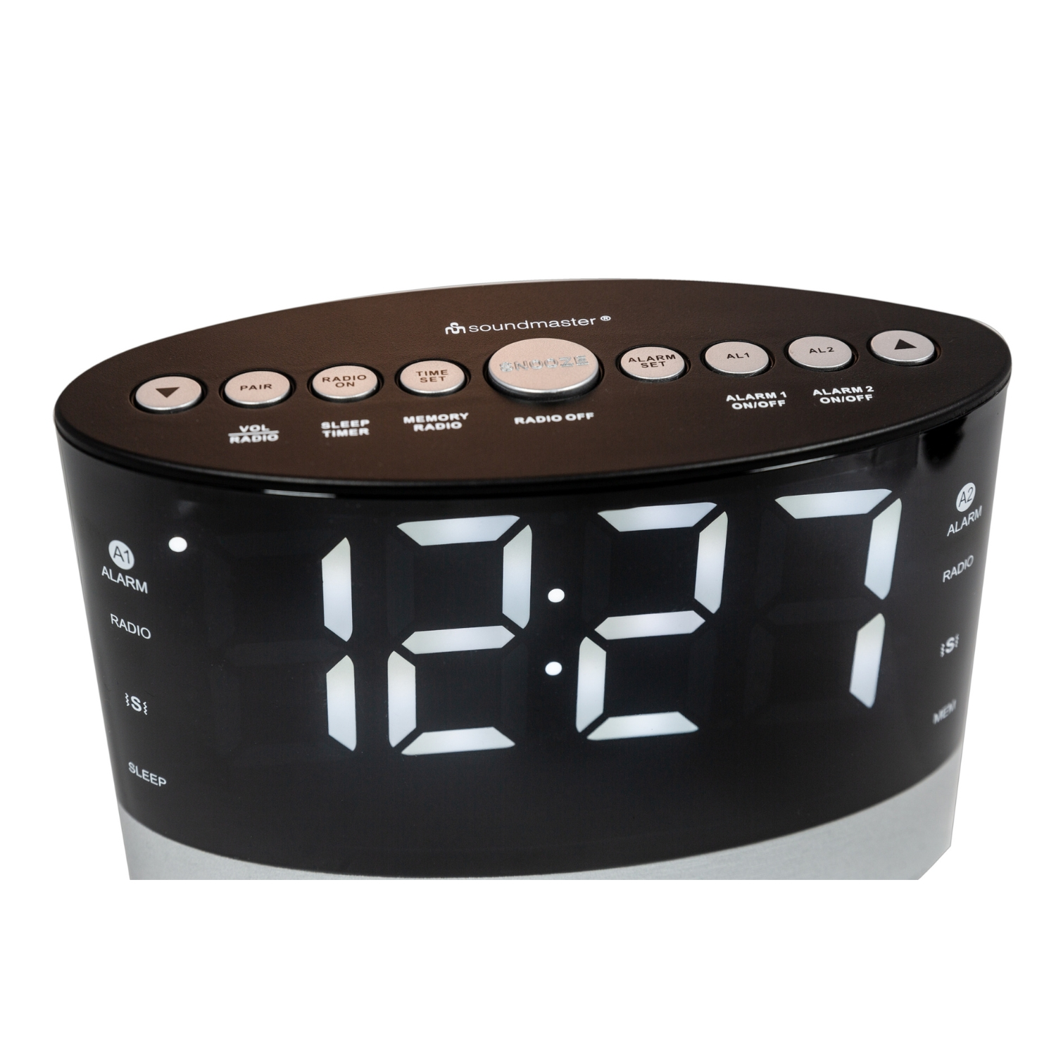 Schwarzer Wecker. Die Uhrzeit ist 12:27. Tasten sind beschriftet: Radio, Sleep, Alarm und Schlummerfunktion.