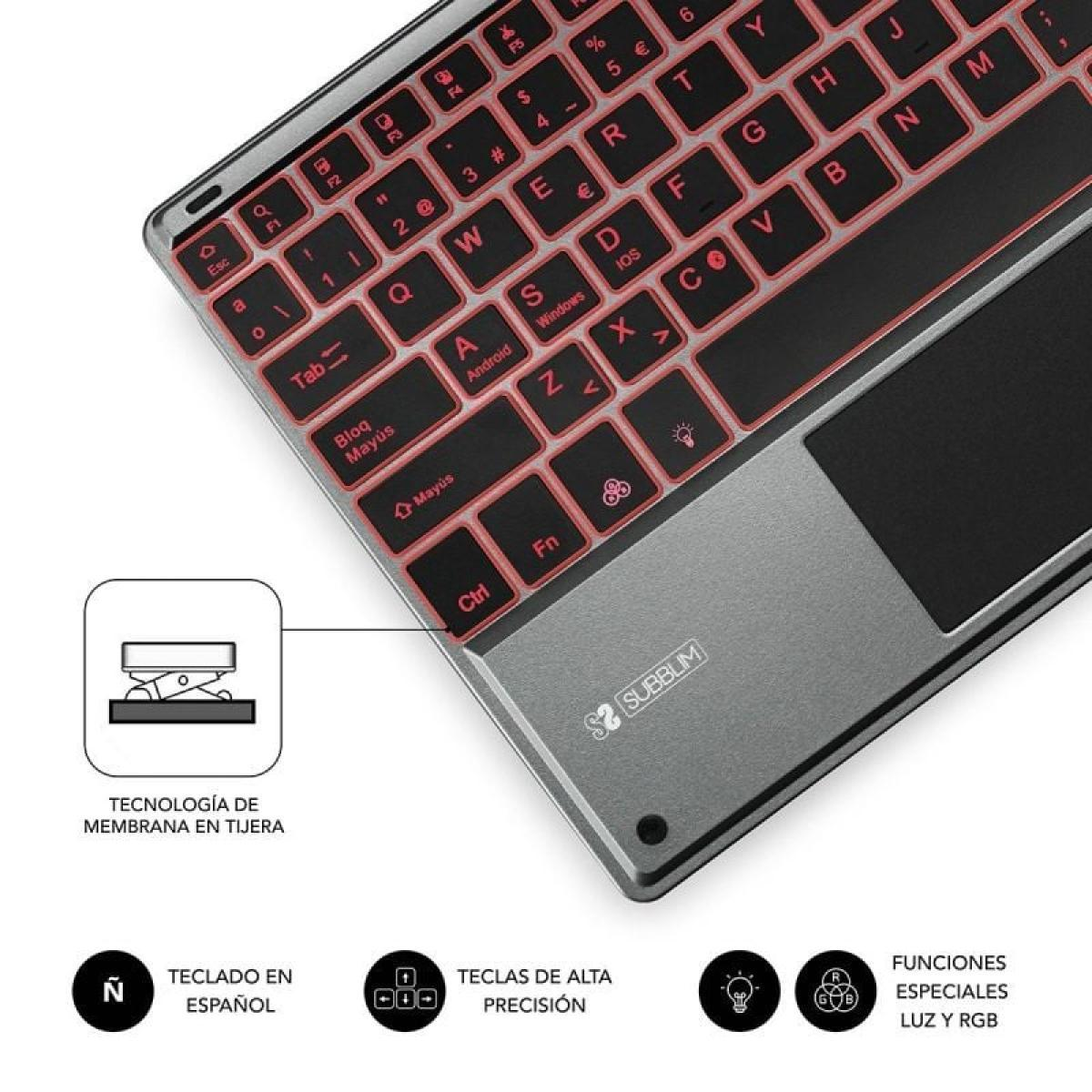 Teclado con teclas retroiluminadas en rojo. Texto: Teclado En Español, Teclas Alta Precision. Gris y negro.