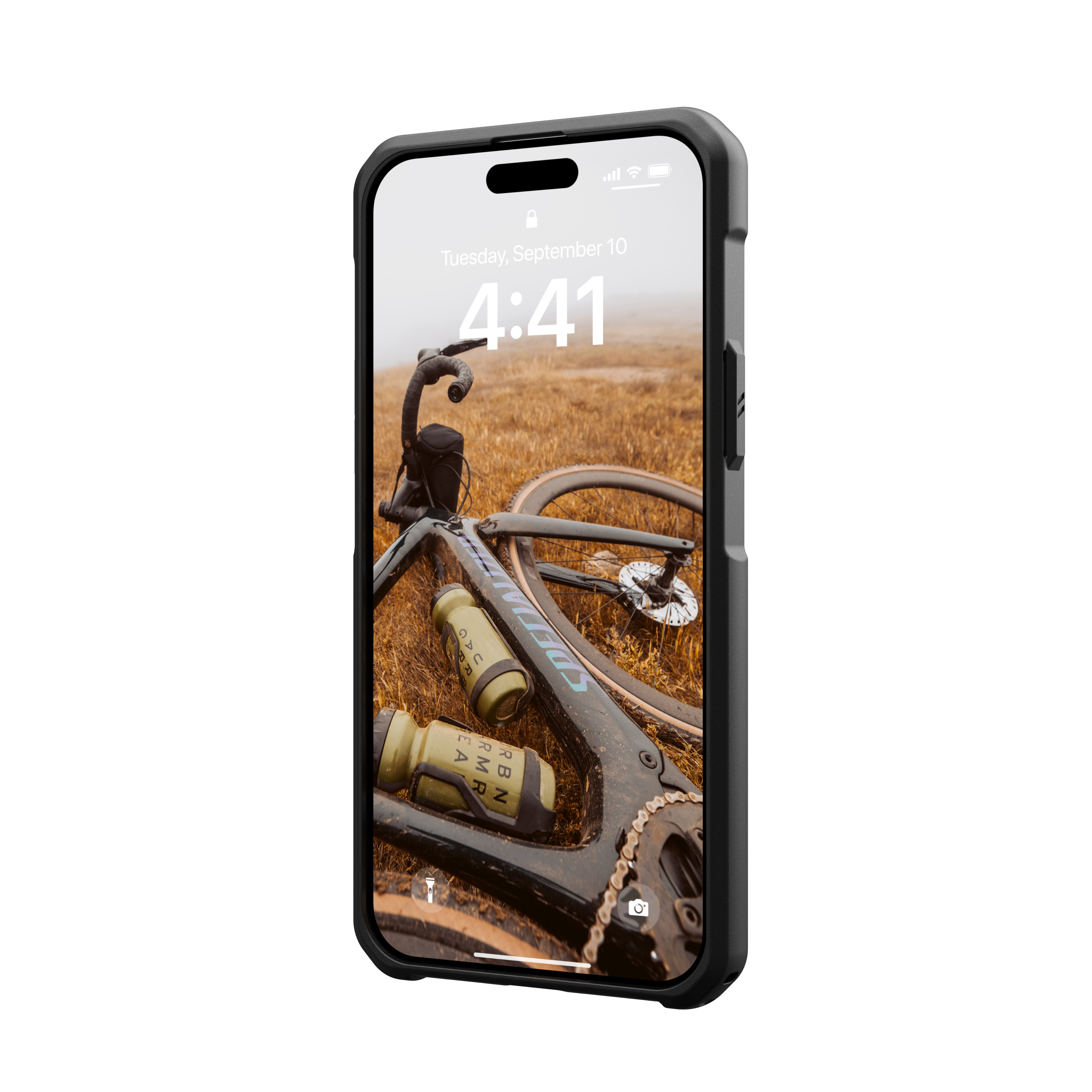 Un telefono mostra una scena di bicicletta. Poggia su una superficie nera. Custodia nera.