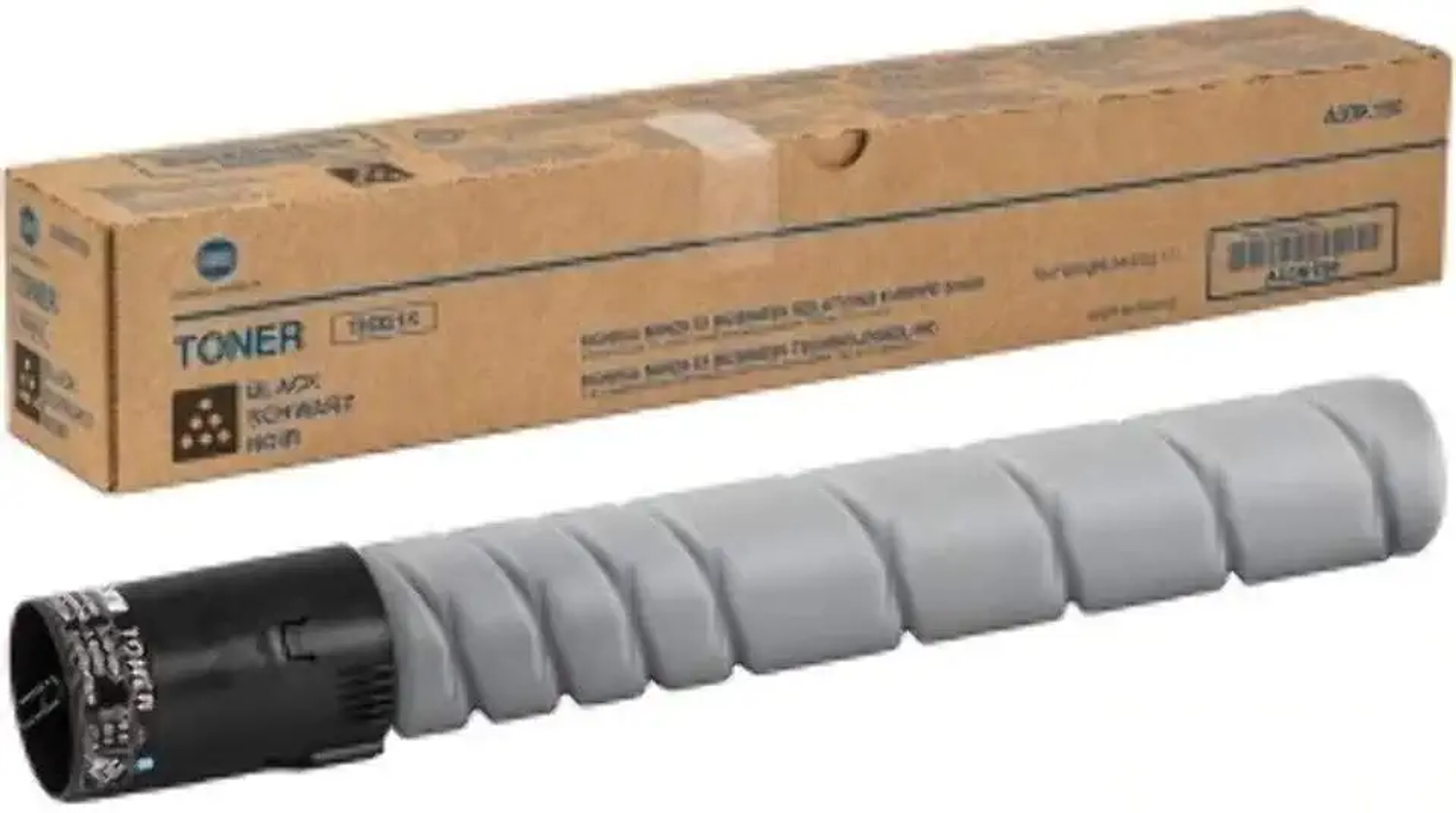 Eine Tonerkartusche und ihre Schachtel. Der Toner ist grau mit einem schwarzen Ende, die Schachtel ist braun.