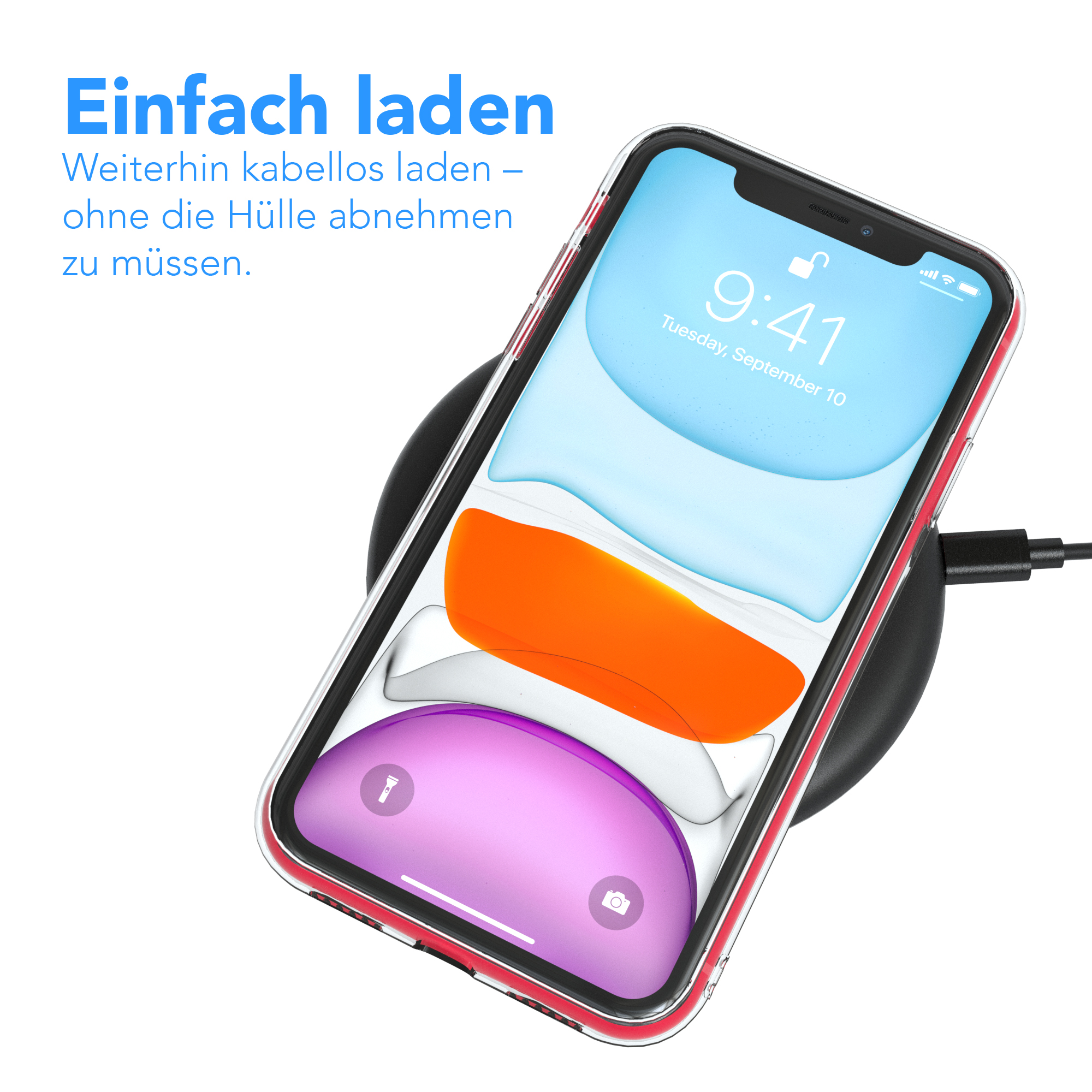 Telefon auf kabellosem Ladegerät, mit transparenter Hülle und pinkem Bildschirm.