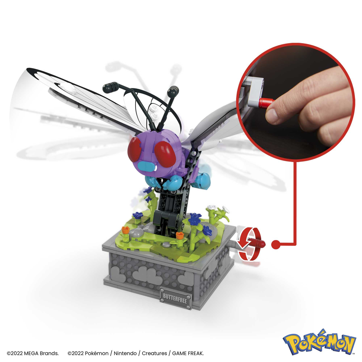 Model Lego Butterfree z ręką obracającą koło, pokazujący mechanizm.